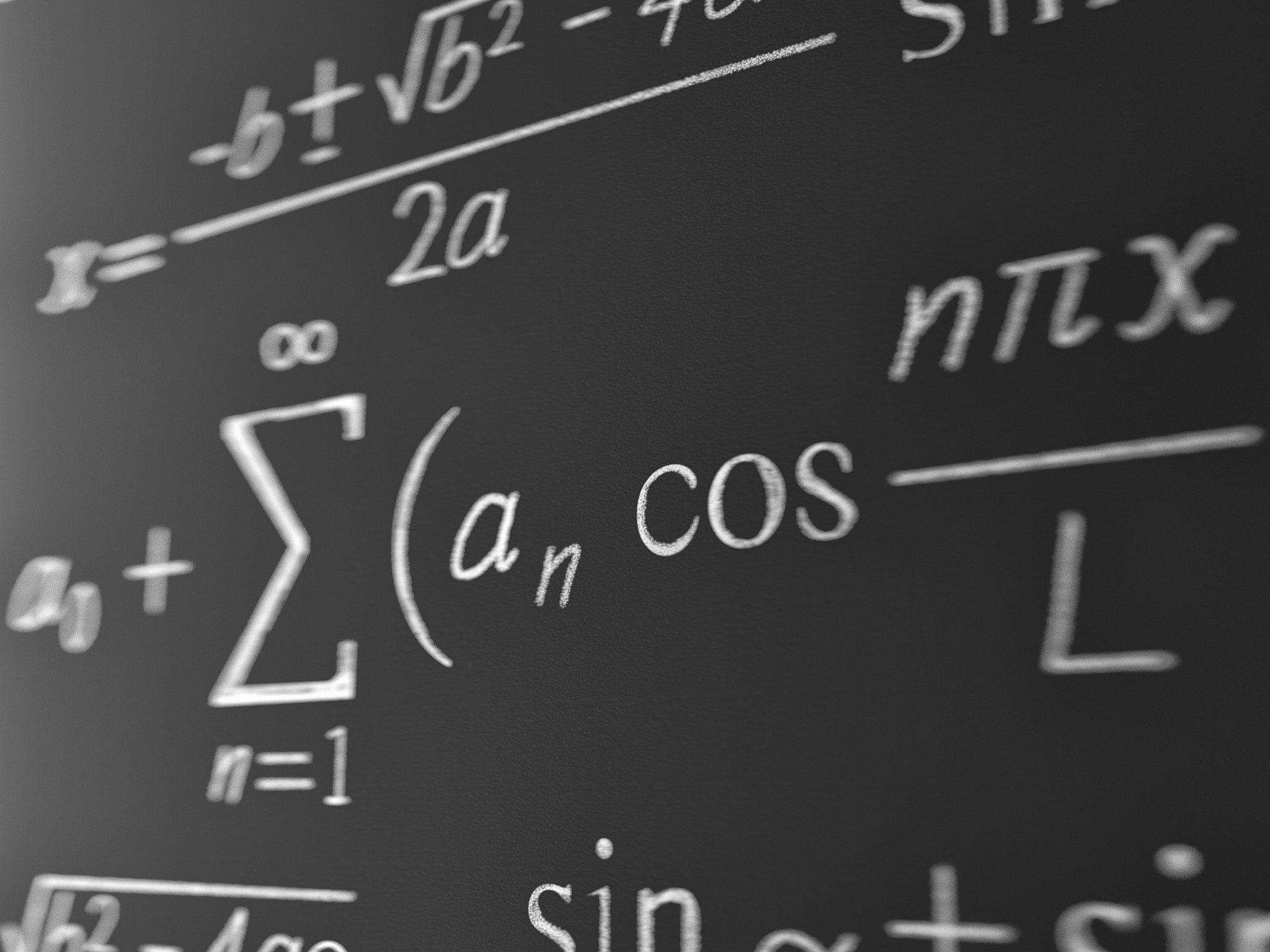 maths formulas written chalk on the blackboard background
