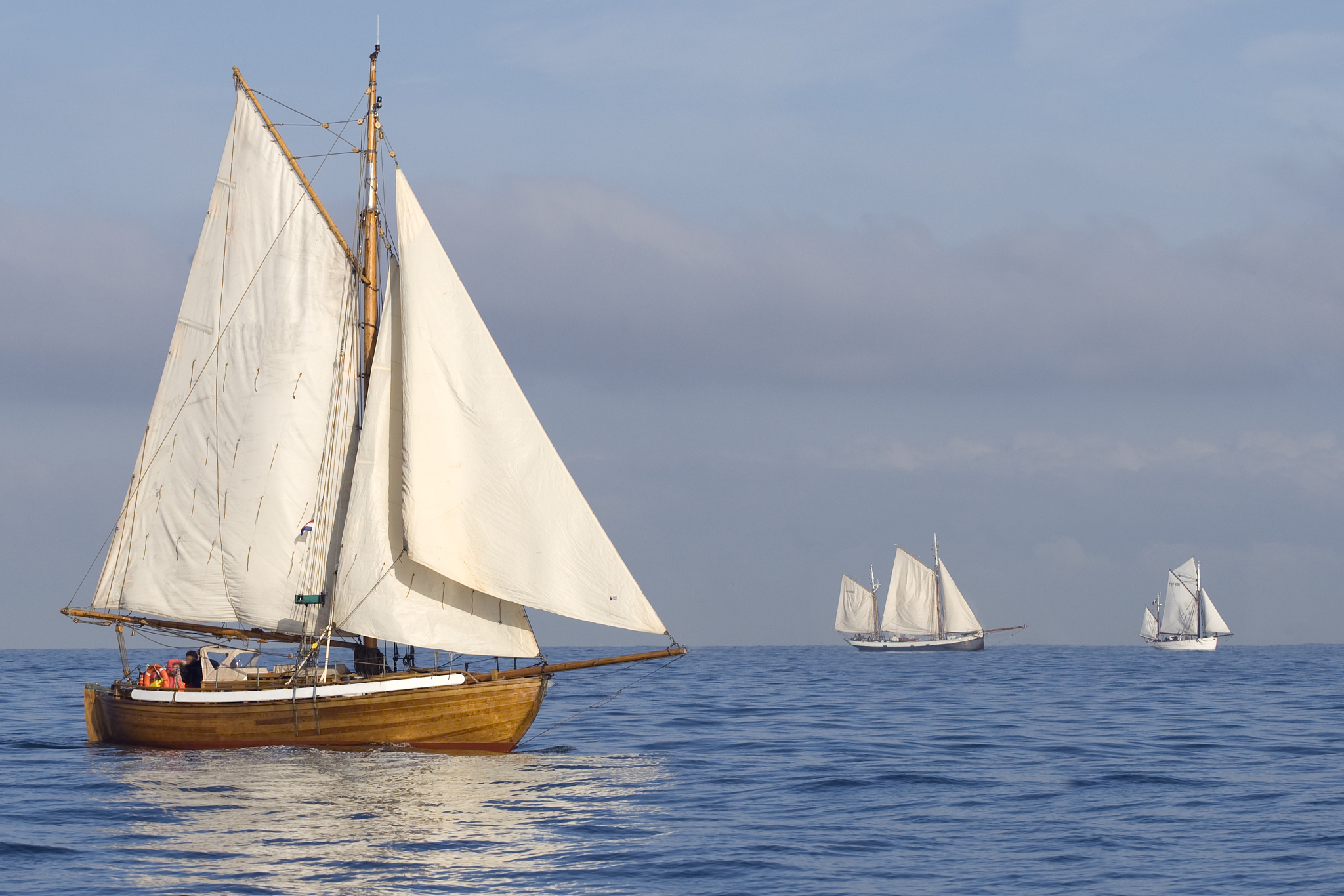 tender with white sails