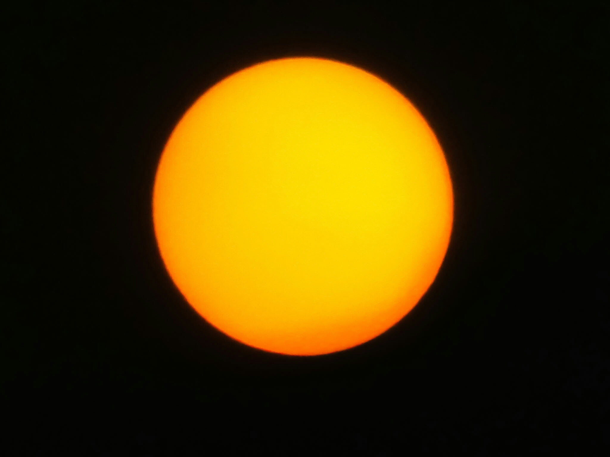 idyllic shot of orange sun against sky