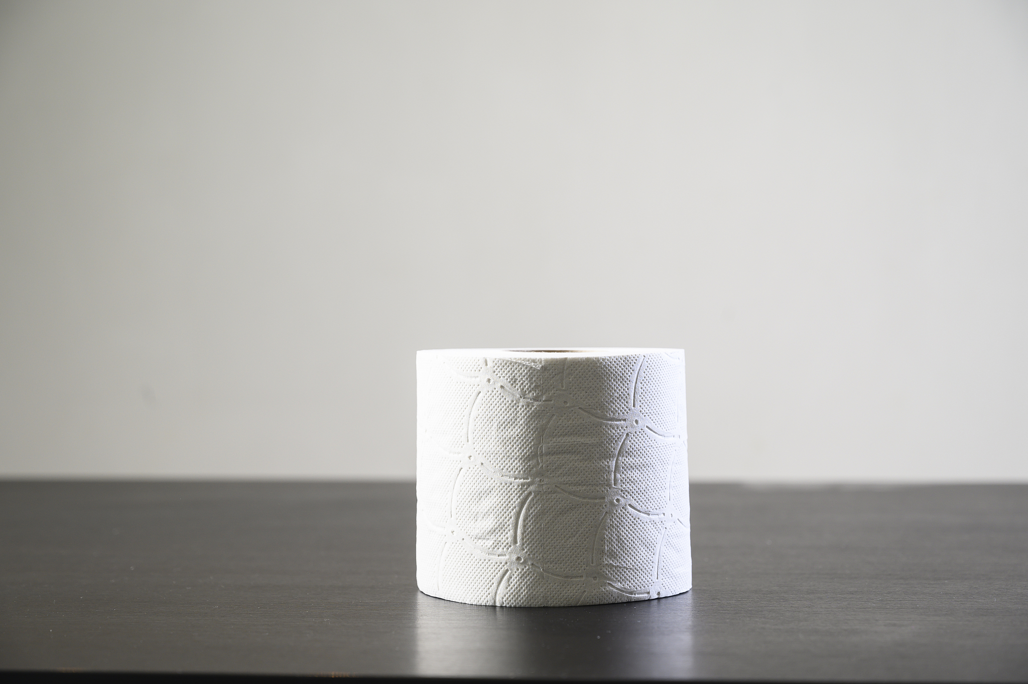 roll of toilet paper on a table.