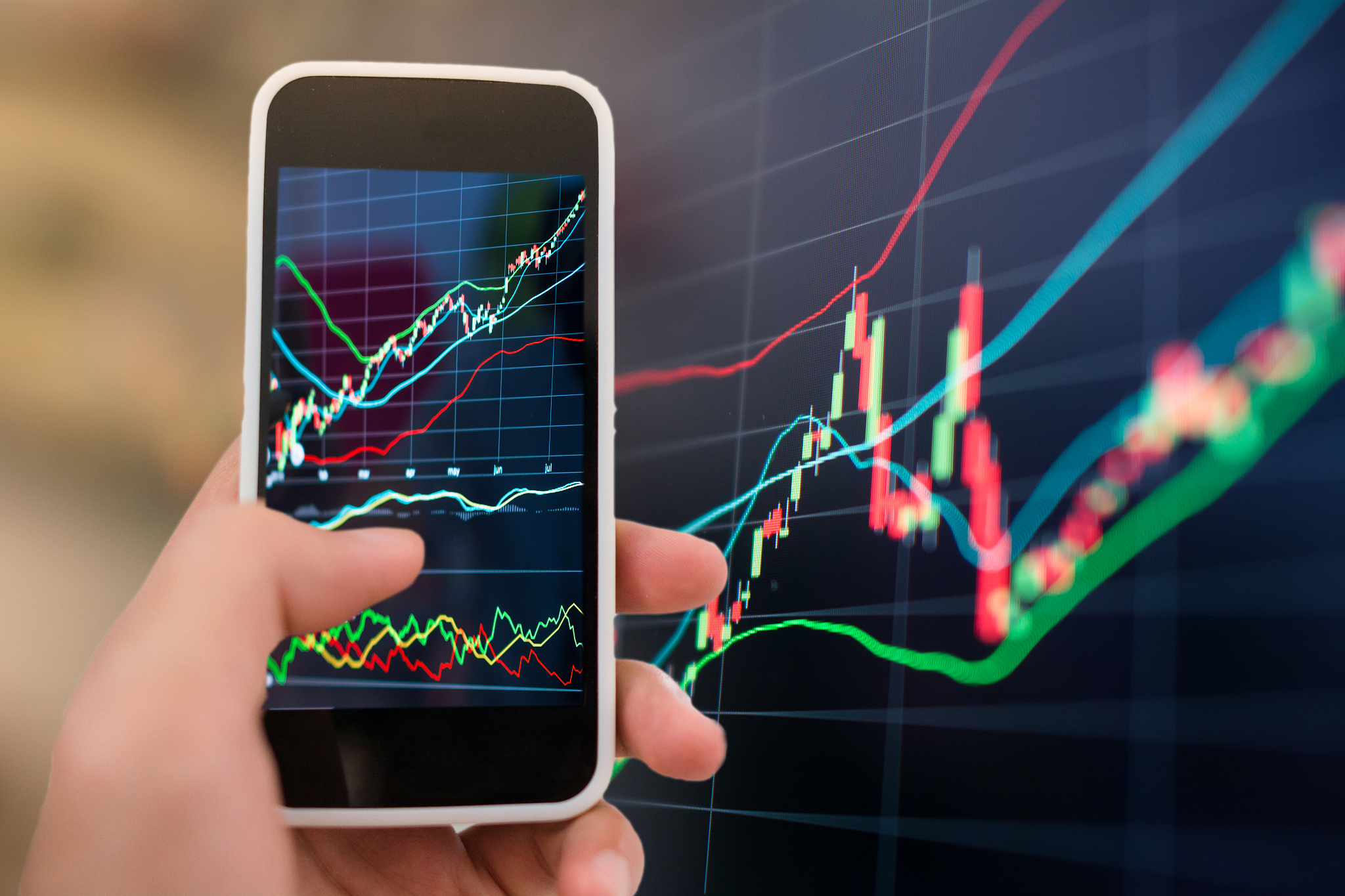 stock market graph and smart phone