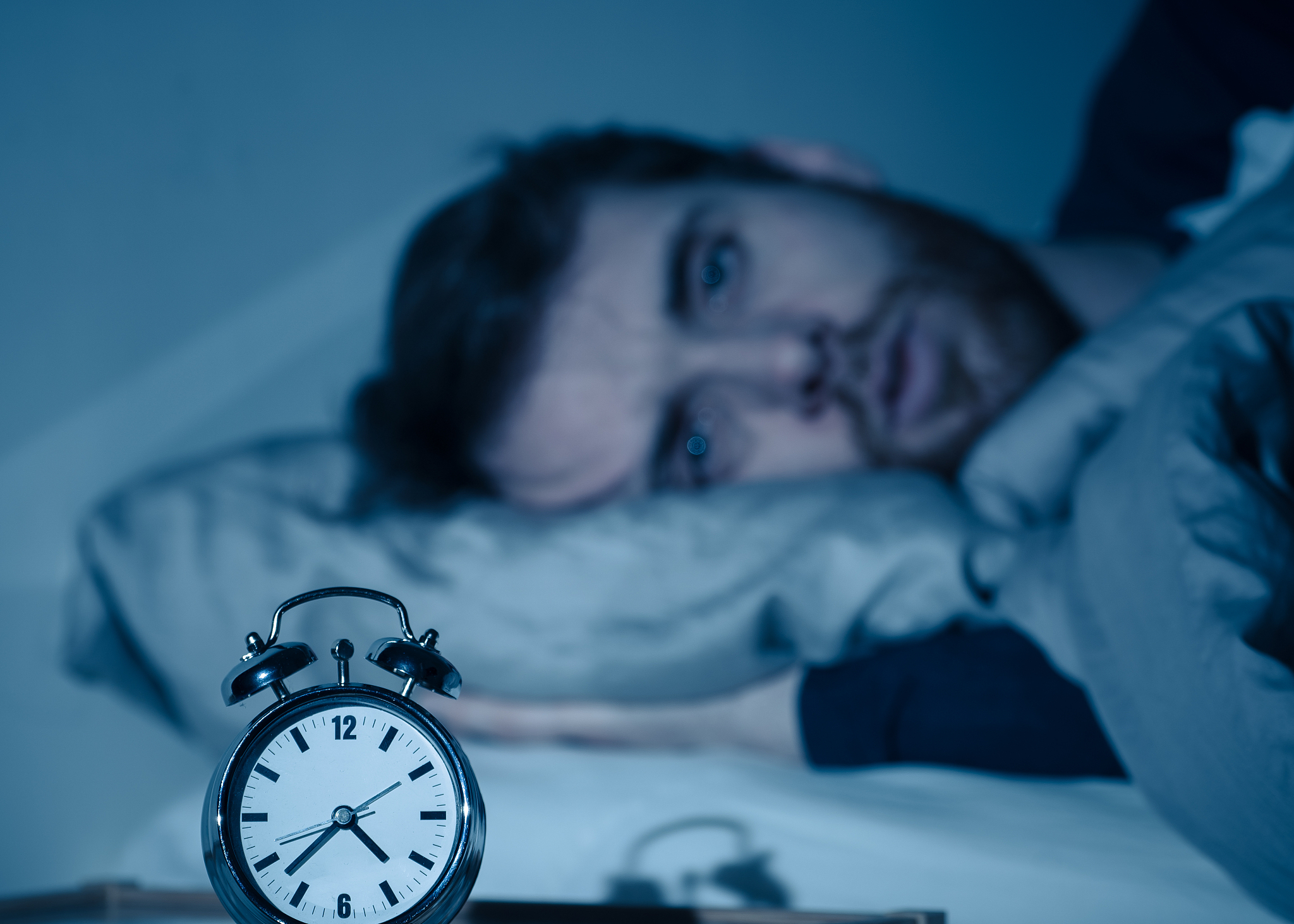 sleepless and desperate young caucasian man awake at night not a