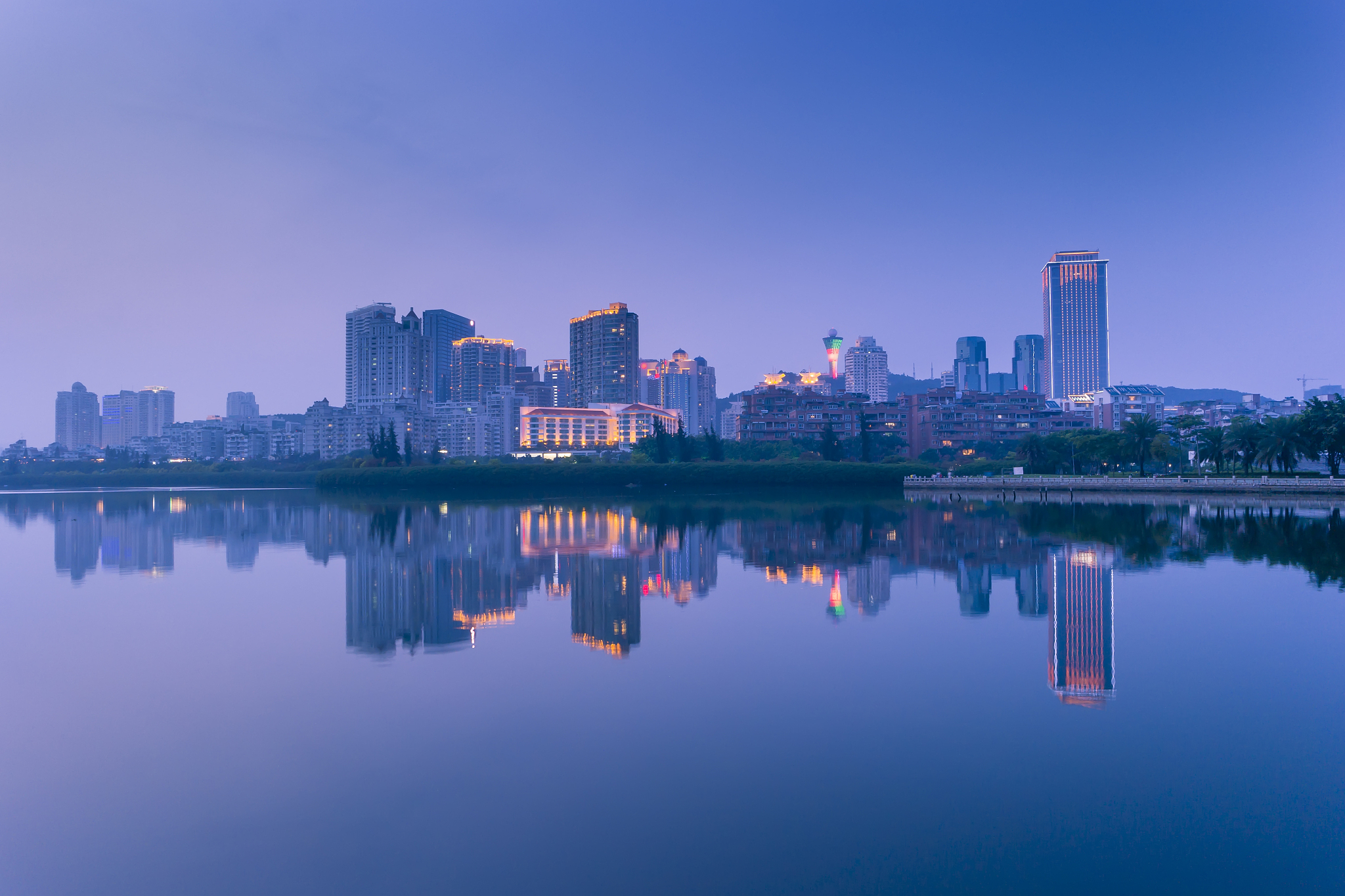 building around bailuzhou park at dusk