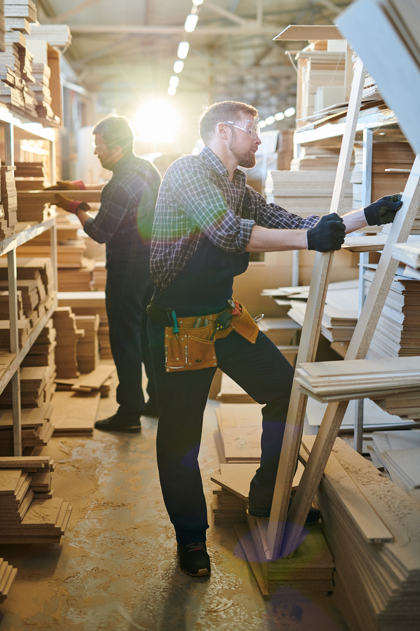 busy assemblers choosing wooden details