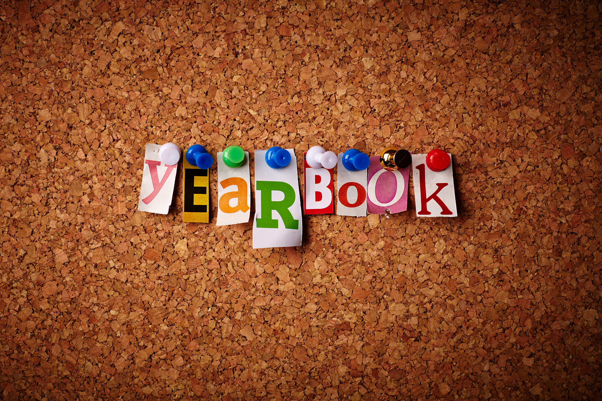 the word yearbook spelled out with magazine clippings