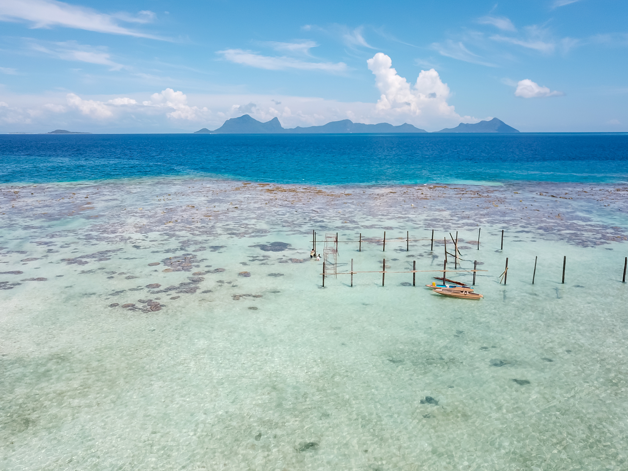 blue azure turquoise lagoon with corals. pulau bum bum island in