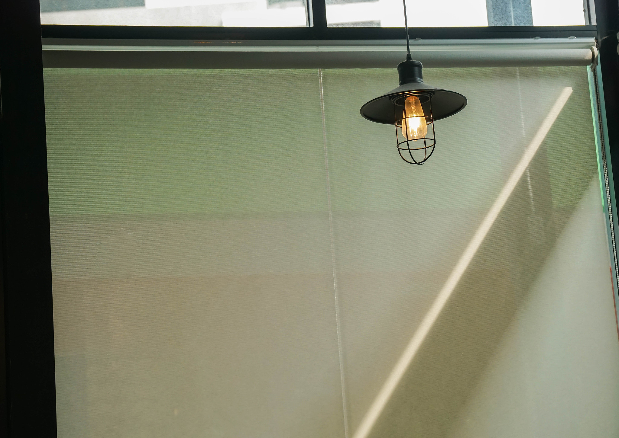 vintage hanging light bulb decorated in restaurant