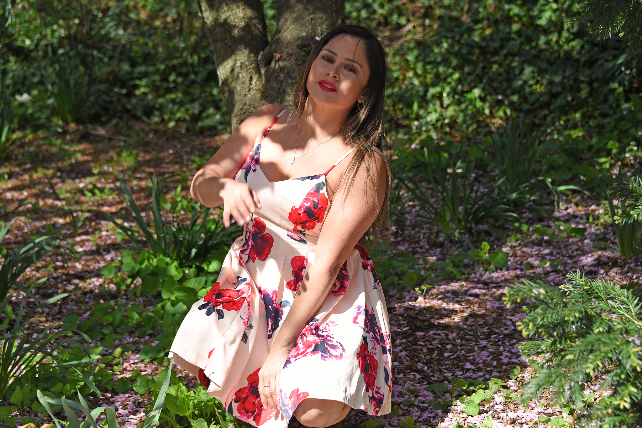 picture of model taken during a pink cherry blossom photo shoot 