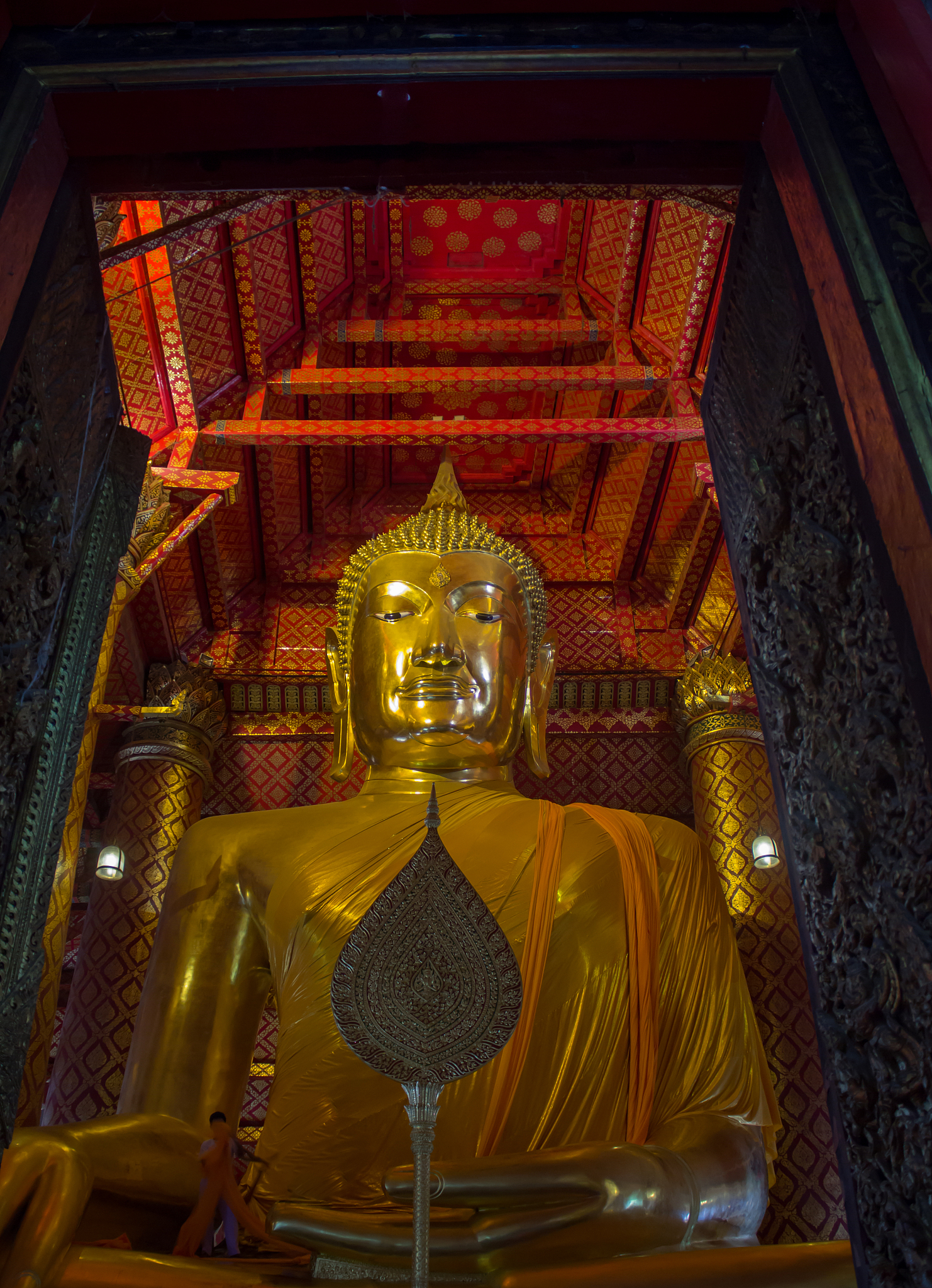 gold big buddha situated in the buddhist temple at wat phanan ch