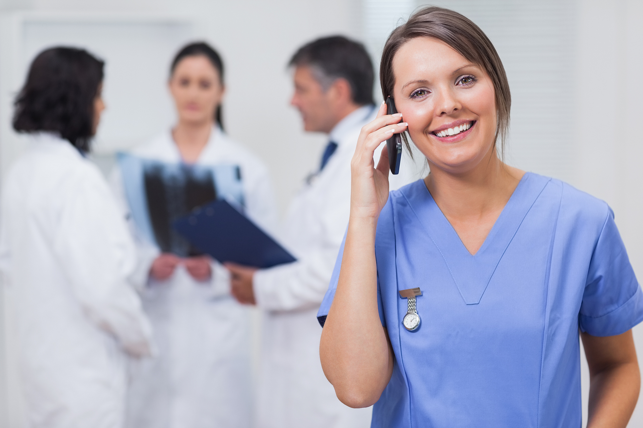 nurse calling with her team