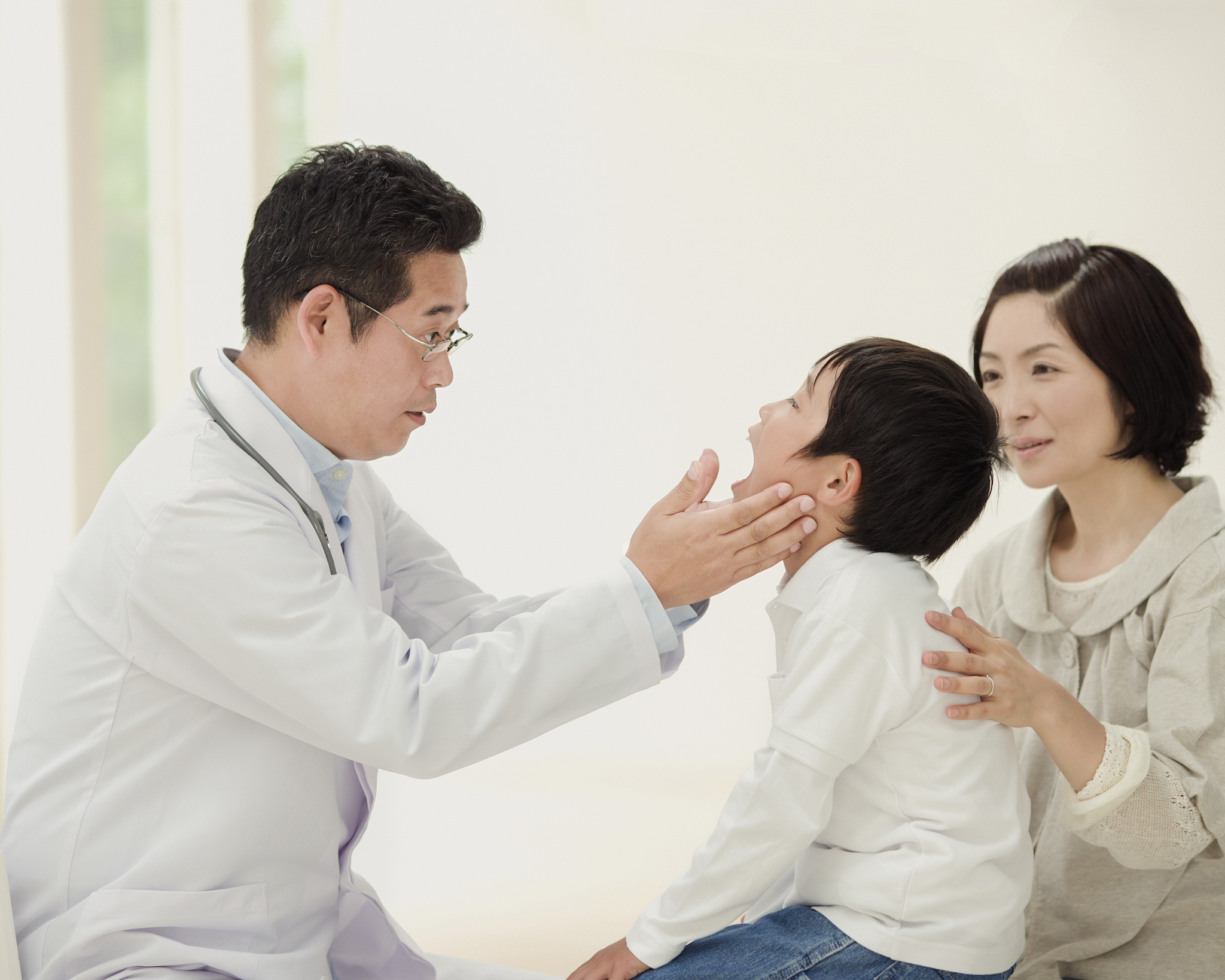 doctor checking patient