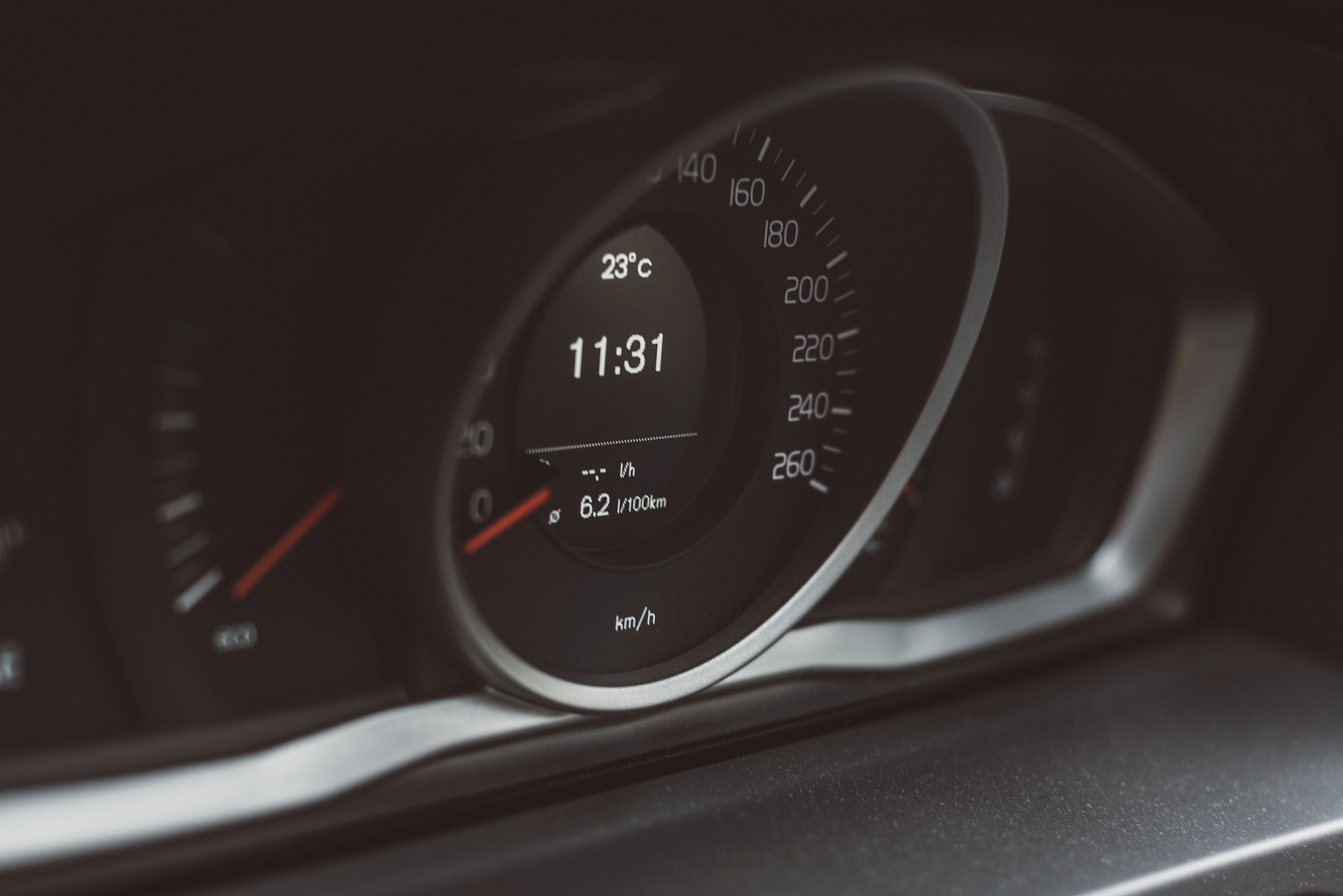 modern car control panel with speedometer.