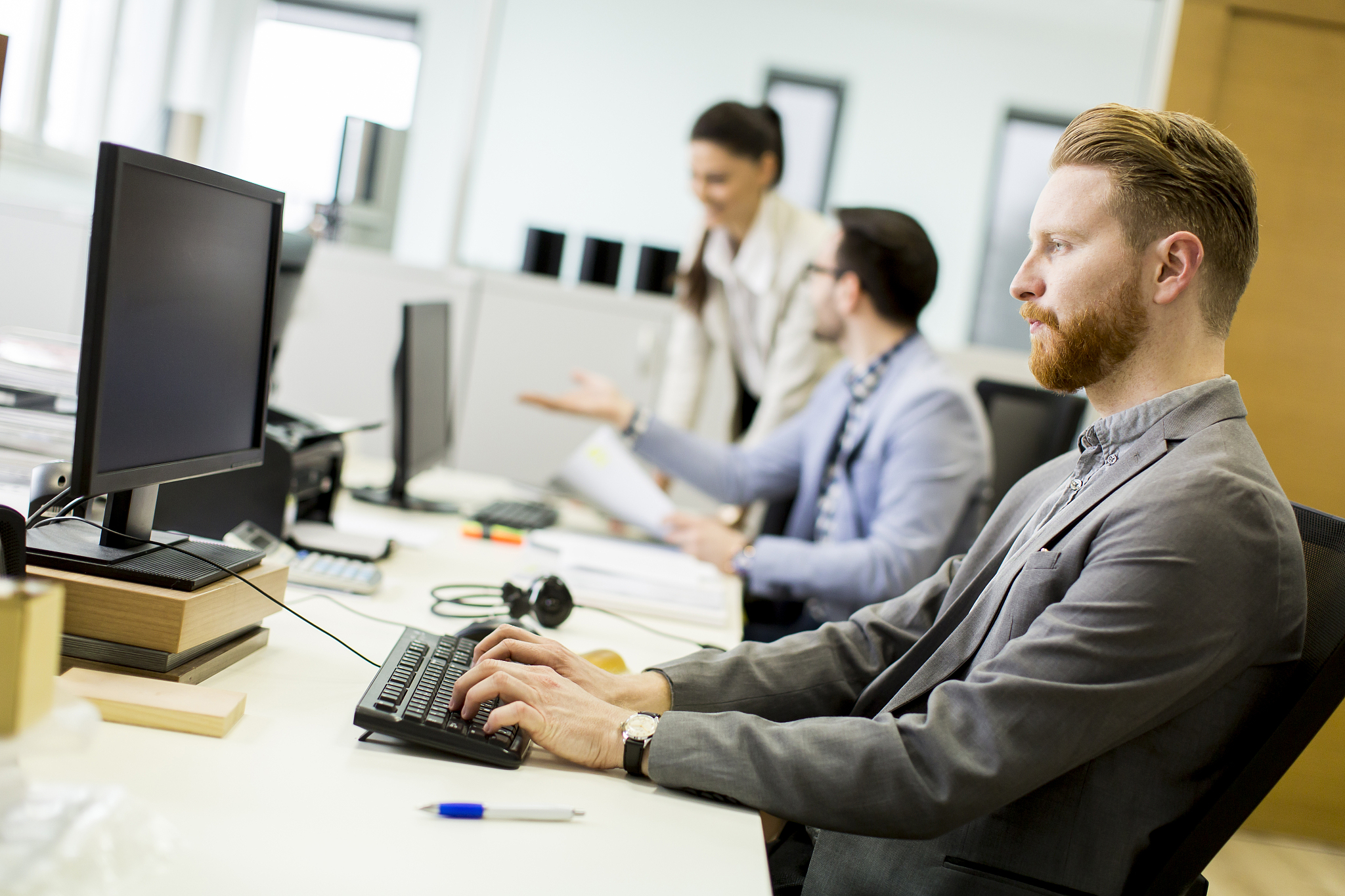 business partners working in modern office