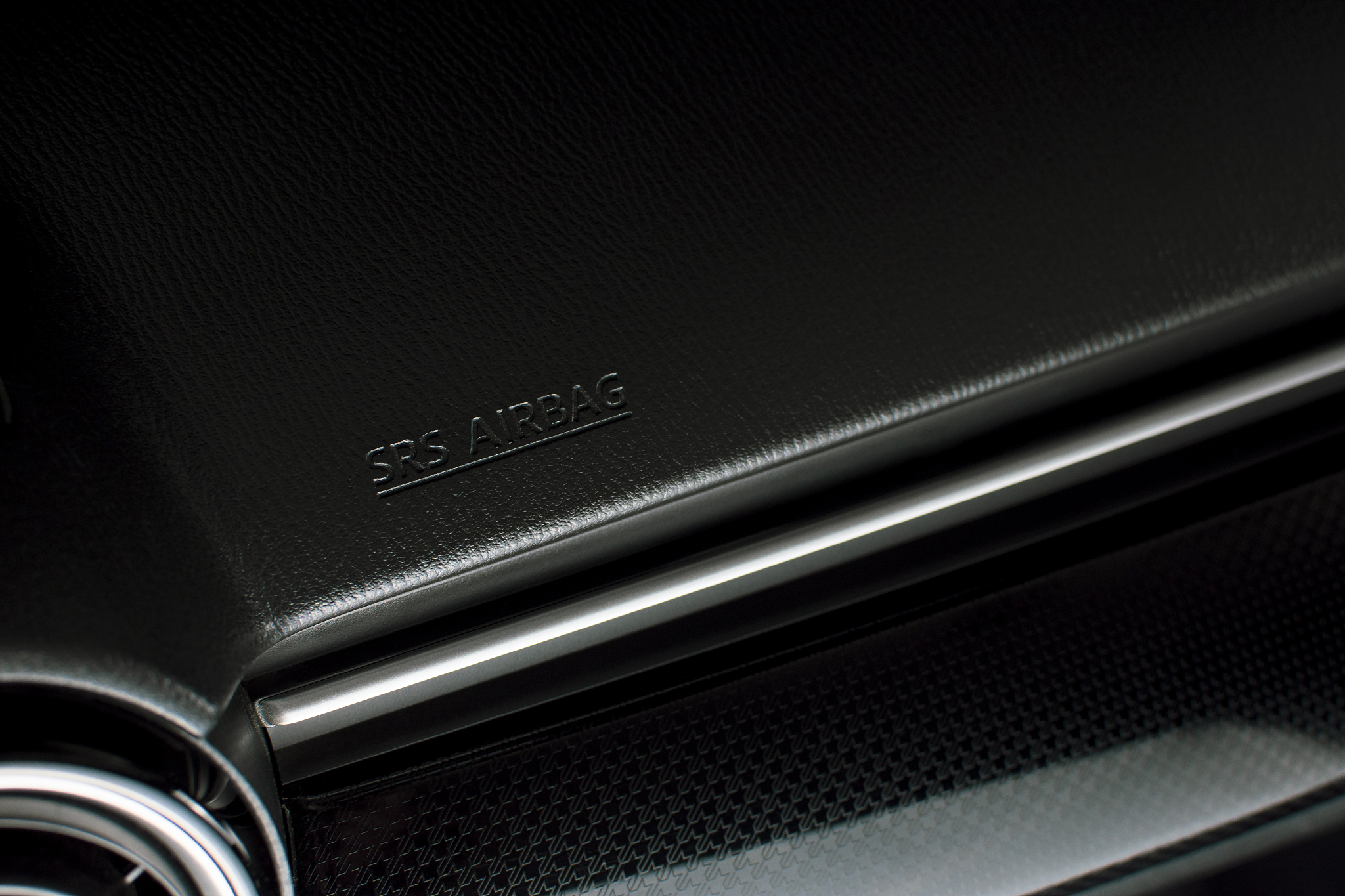 srs airbag icon on a car console panel.