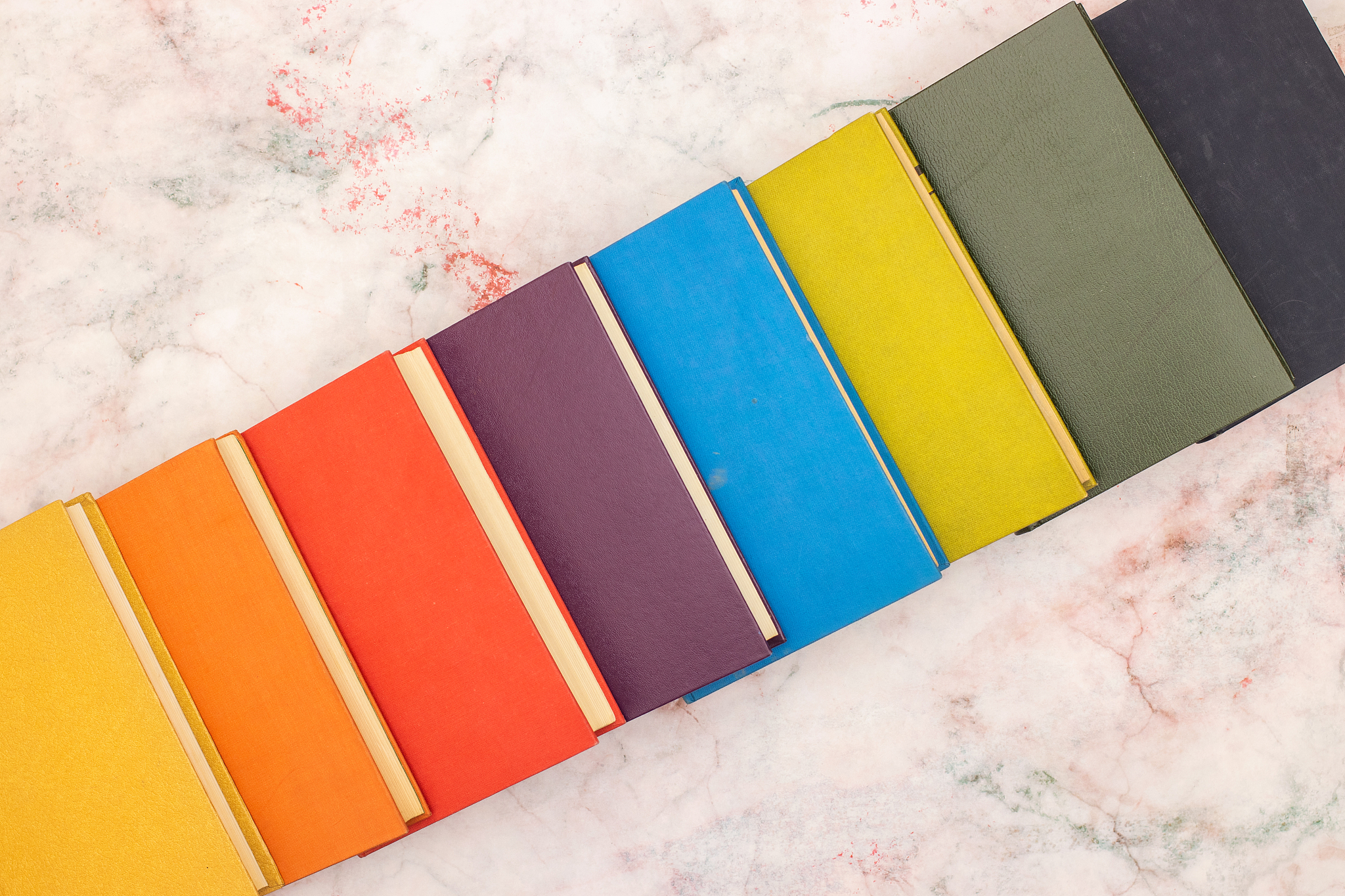 books in many colors on the table for reading