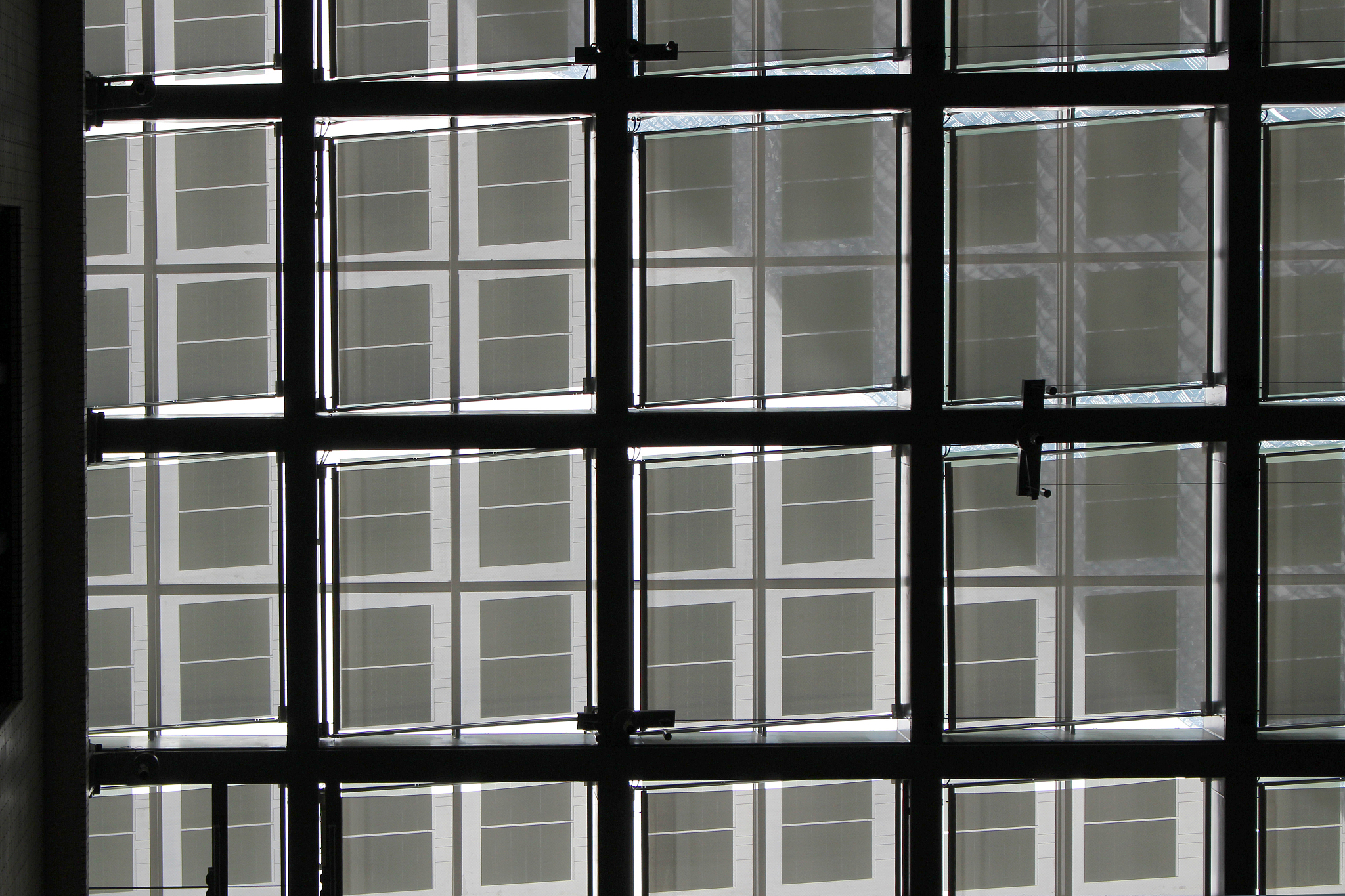geometric glass ceiling with sunlight