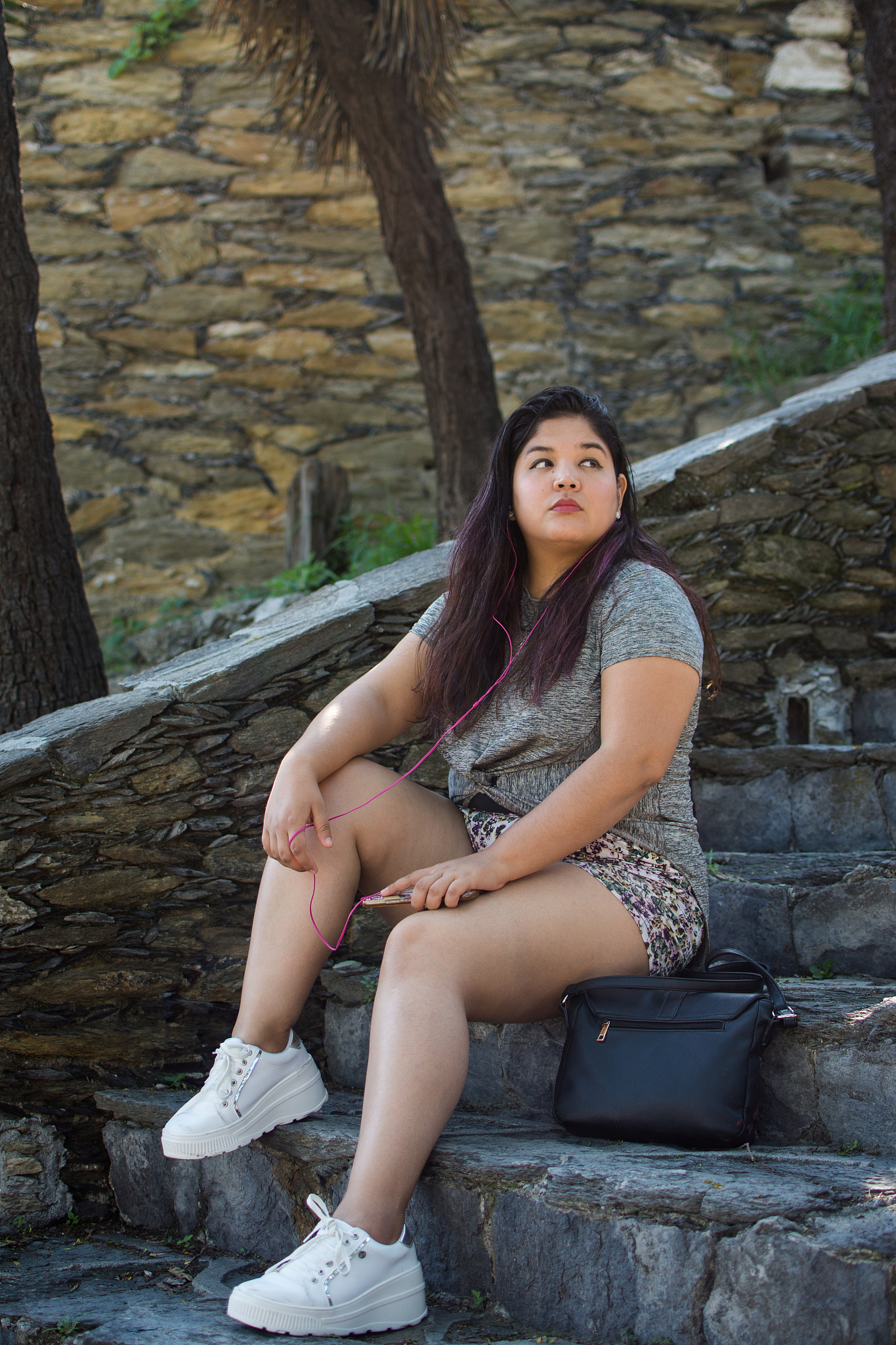 young woman listening to music.