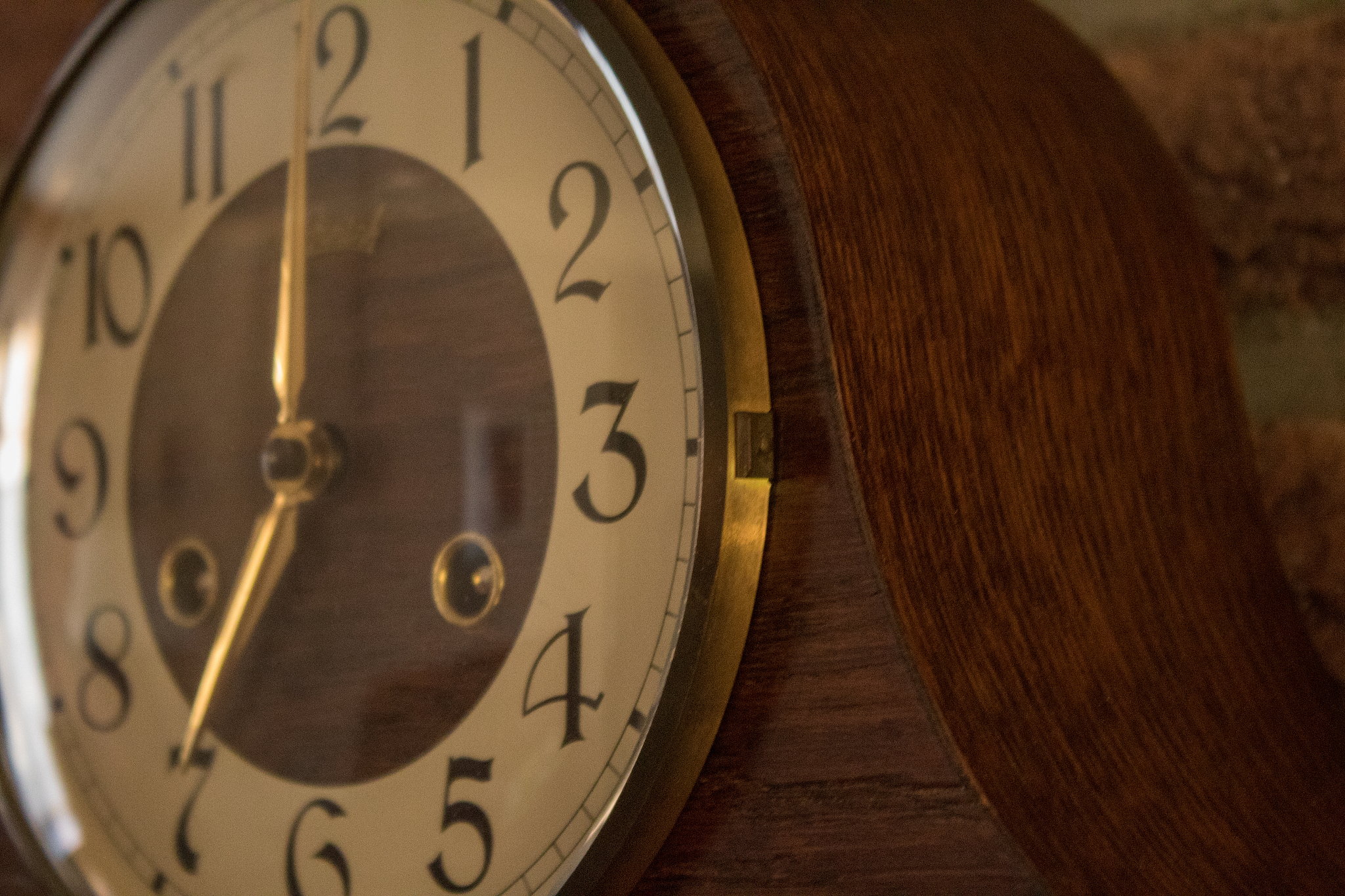 close-up of clock on wood