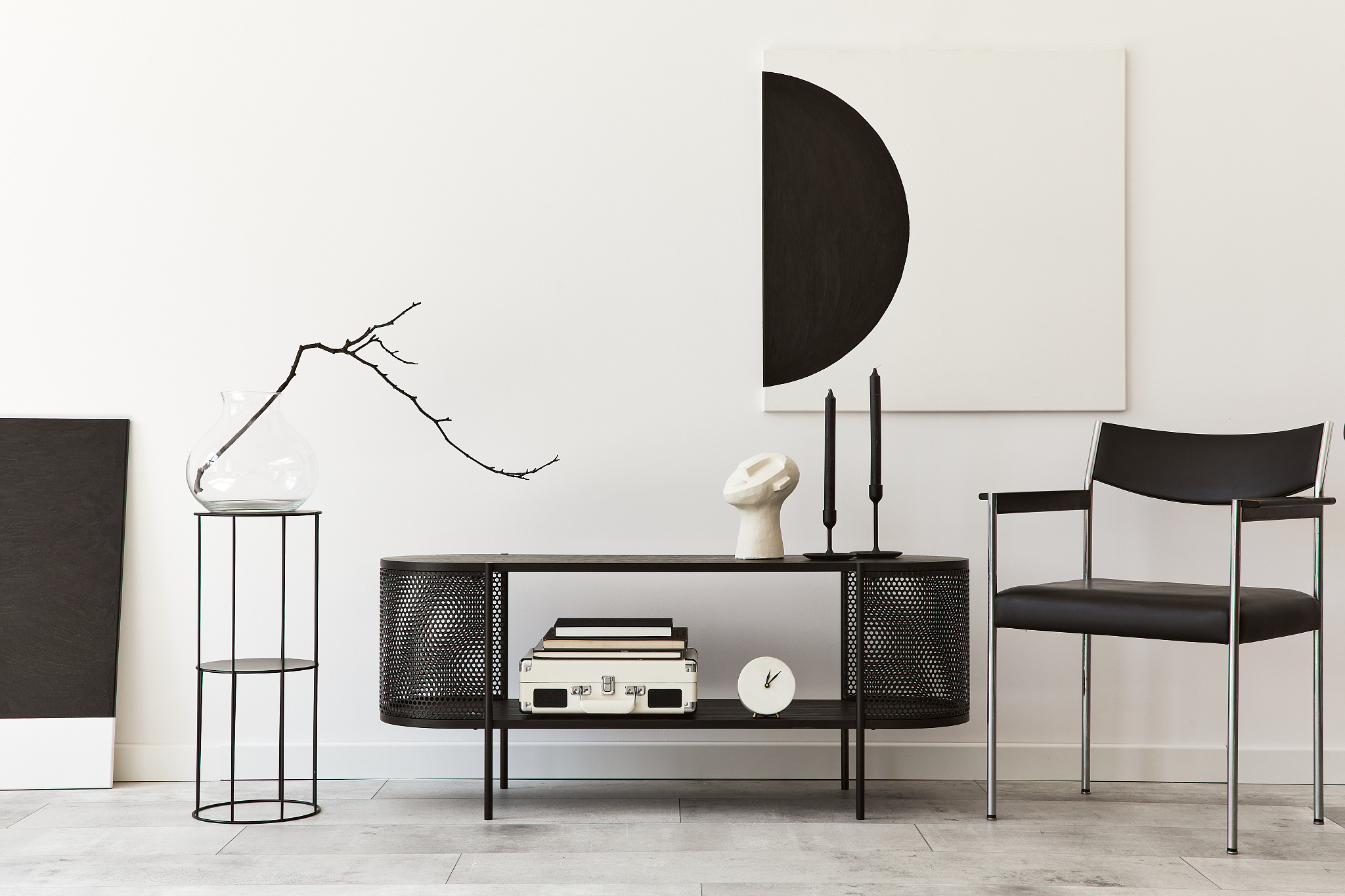 interior design of modern living room with black stylish commode