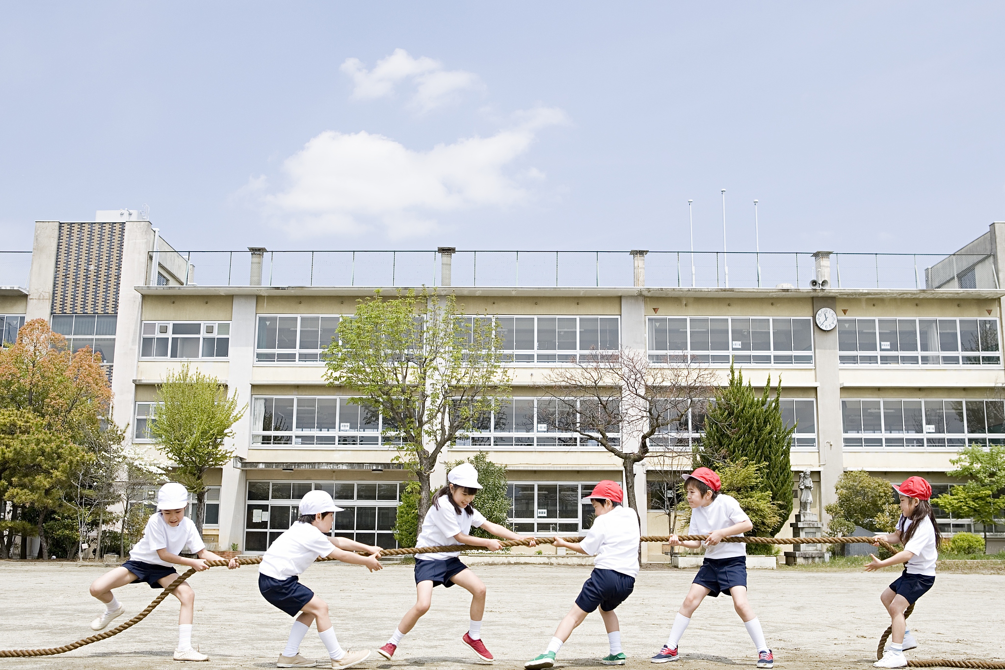 children playing tug of war