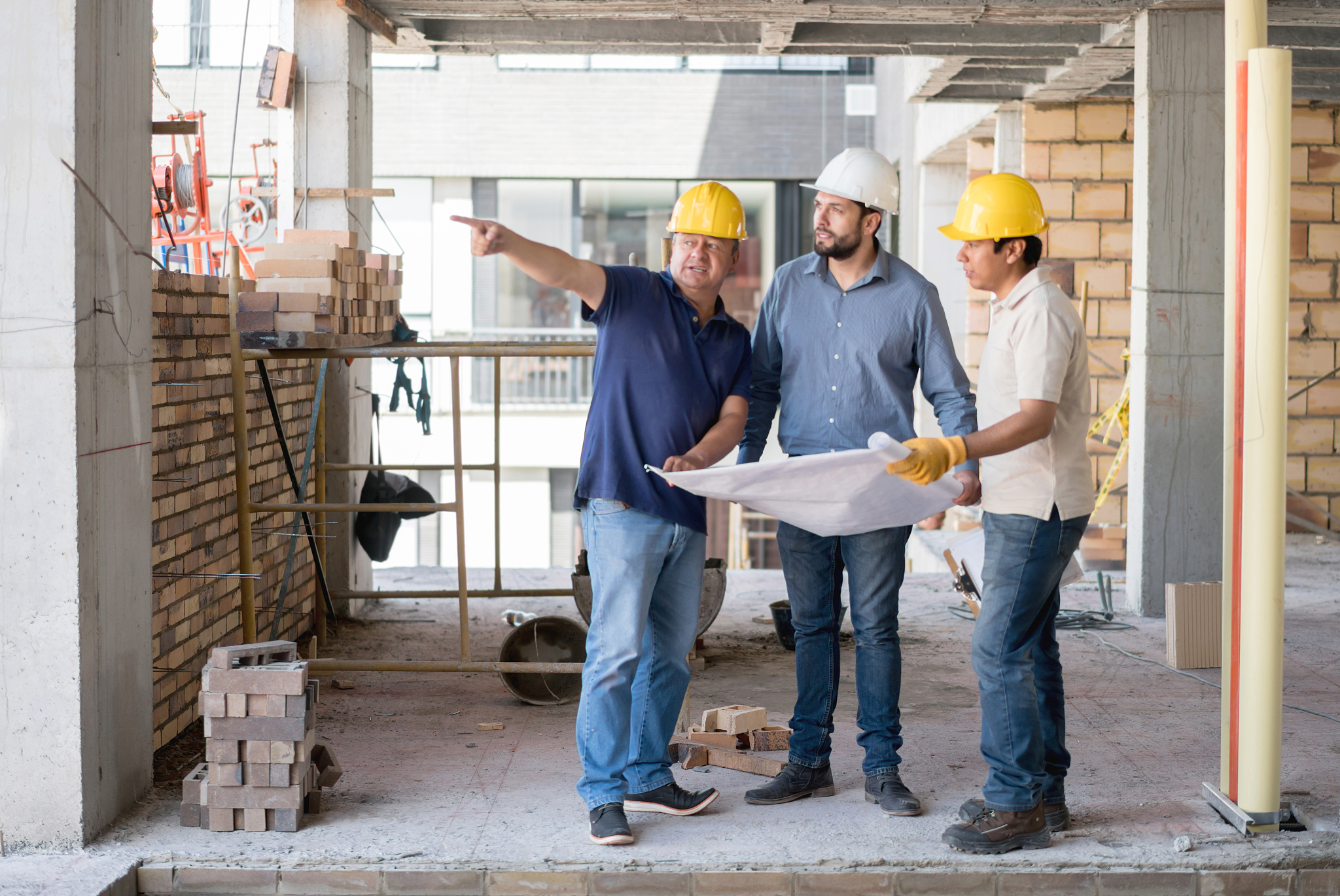 group of engineers looking at a construction site