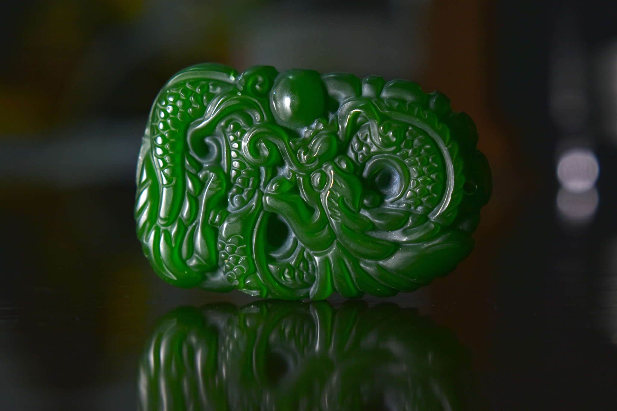 jade carving it is a green dragon.