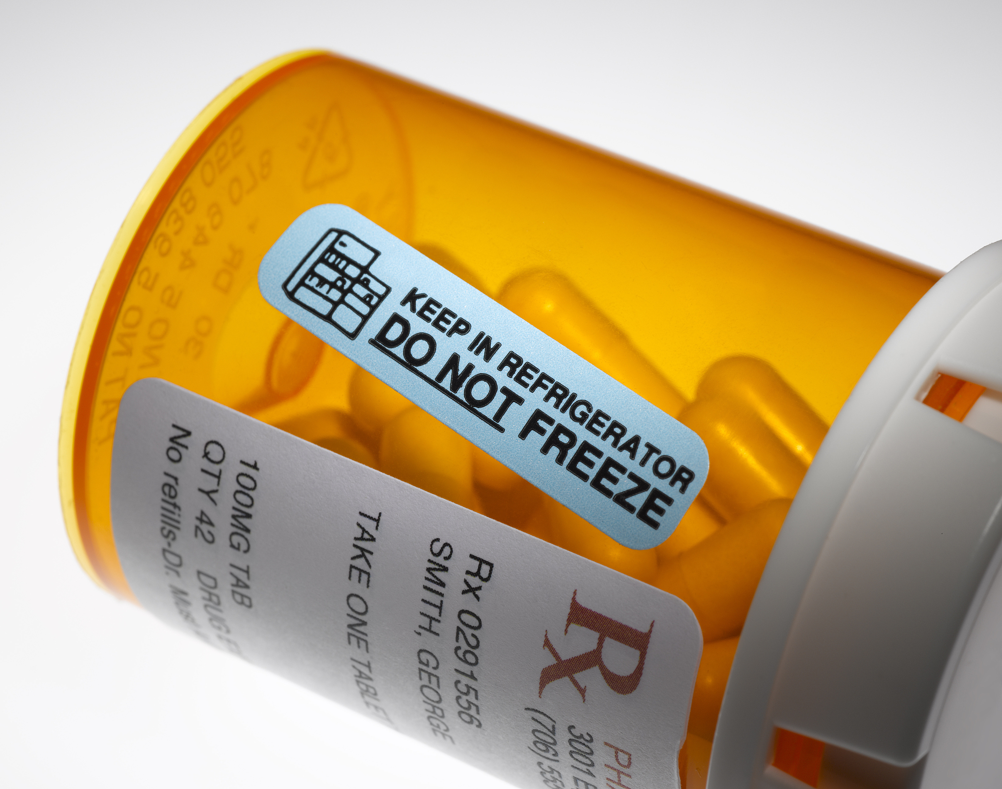 prescription bottle with warning label