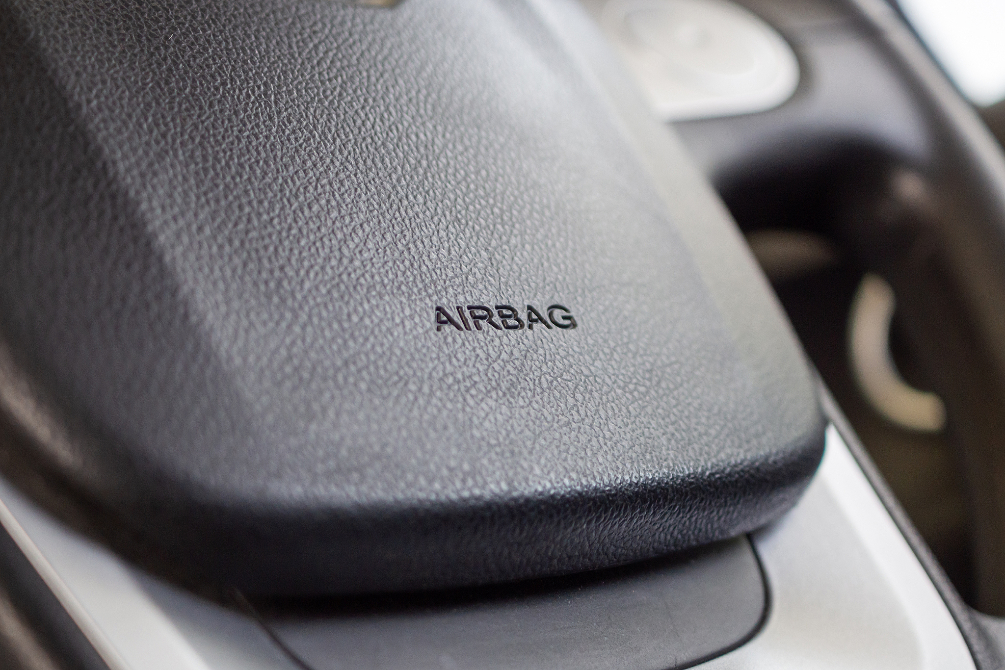 safety airbag sign on car steering wheel