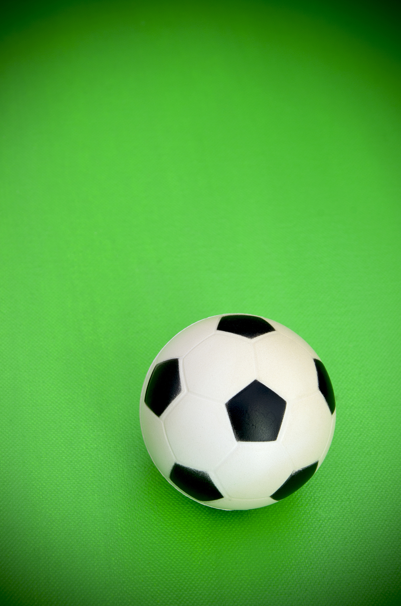 soccer ball on green background