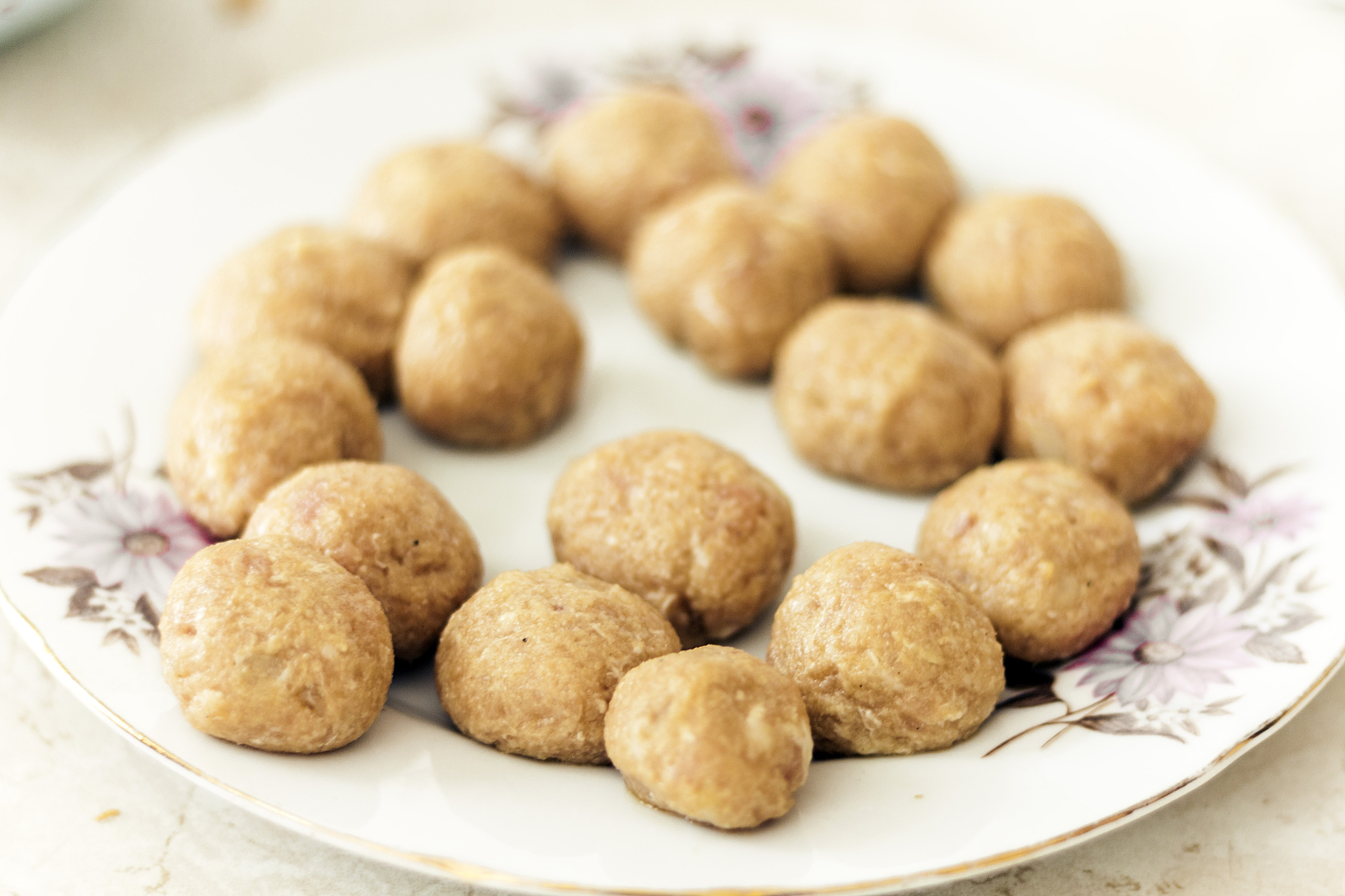 preparing, cooking, making meatballs for homemade fried minced m