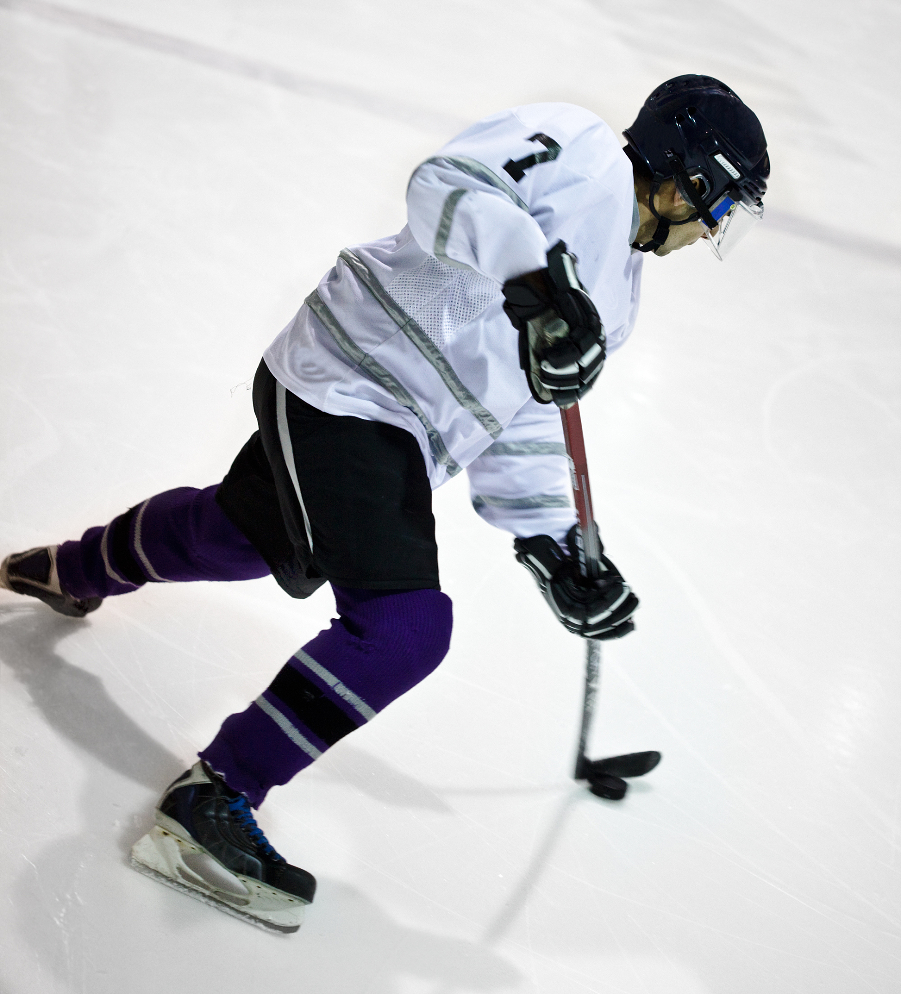 hockey player shooting