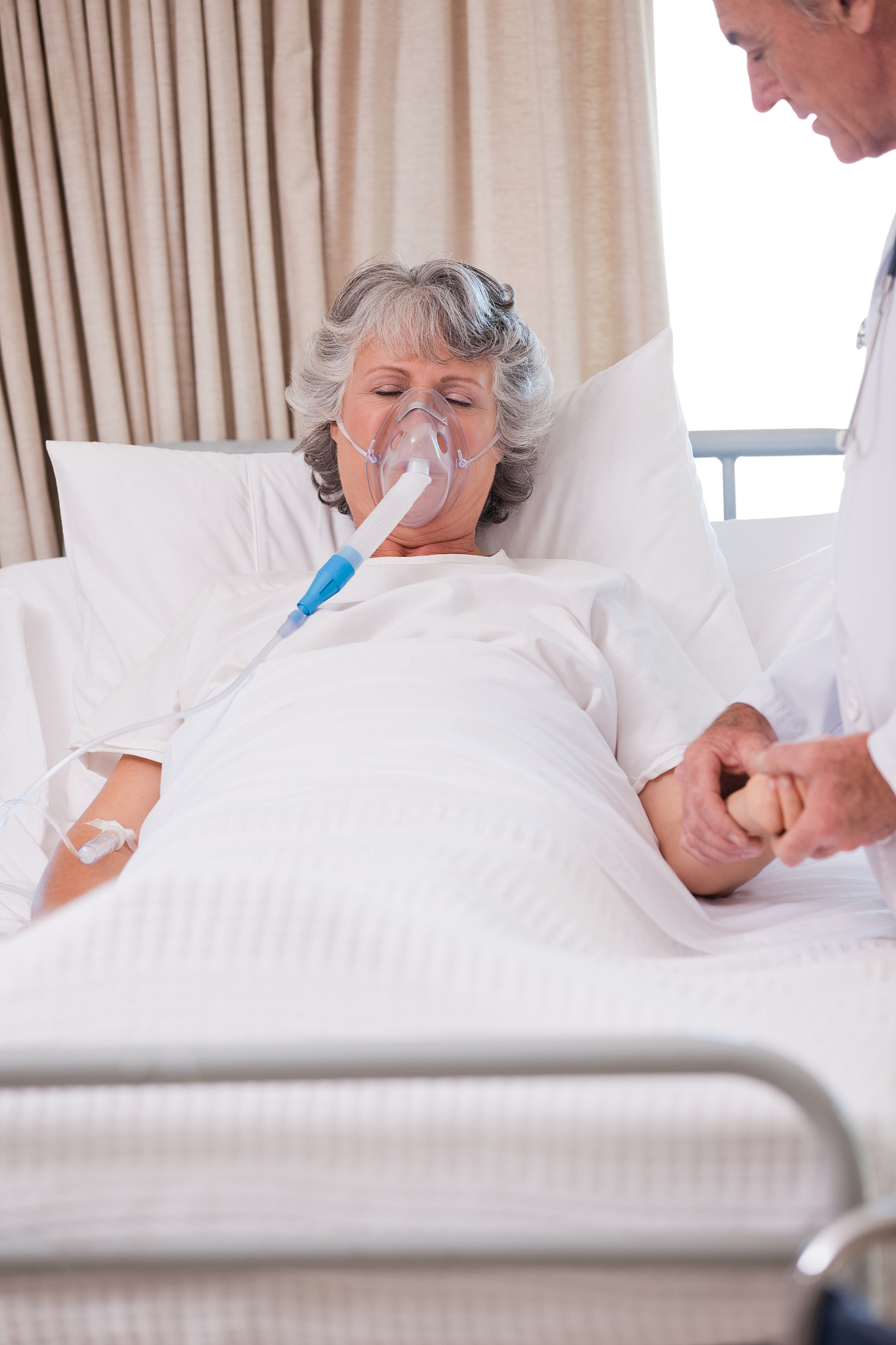 senior doctor with his sick patient