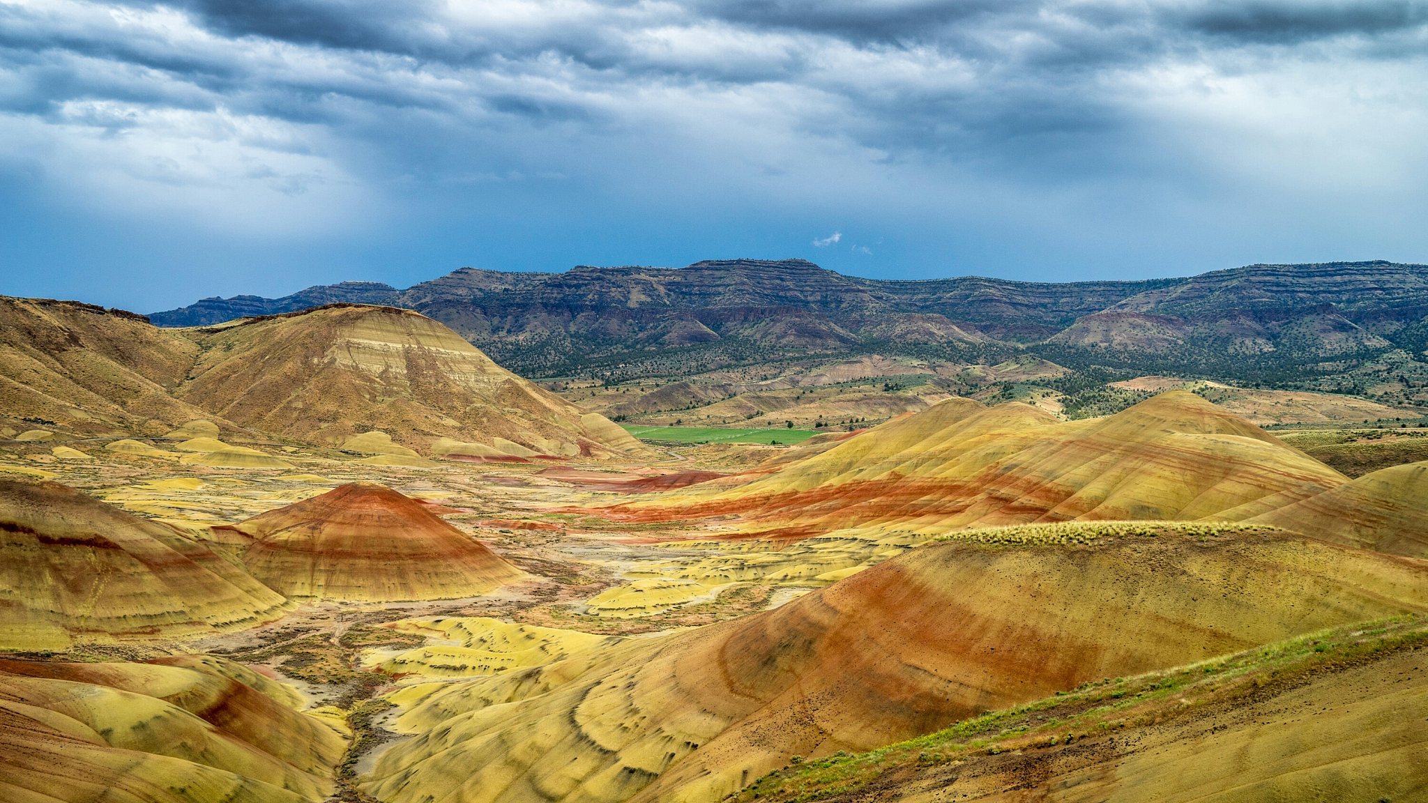 idyllic view of landscape at painted hills against cloudy sky