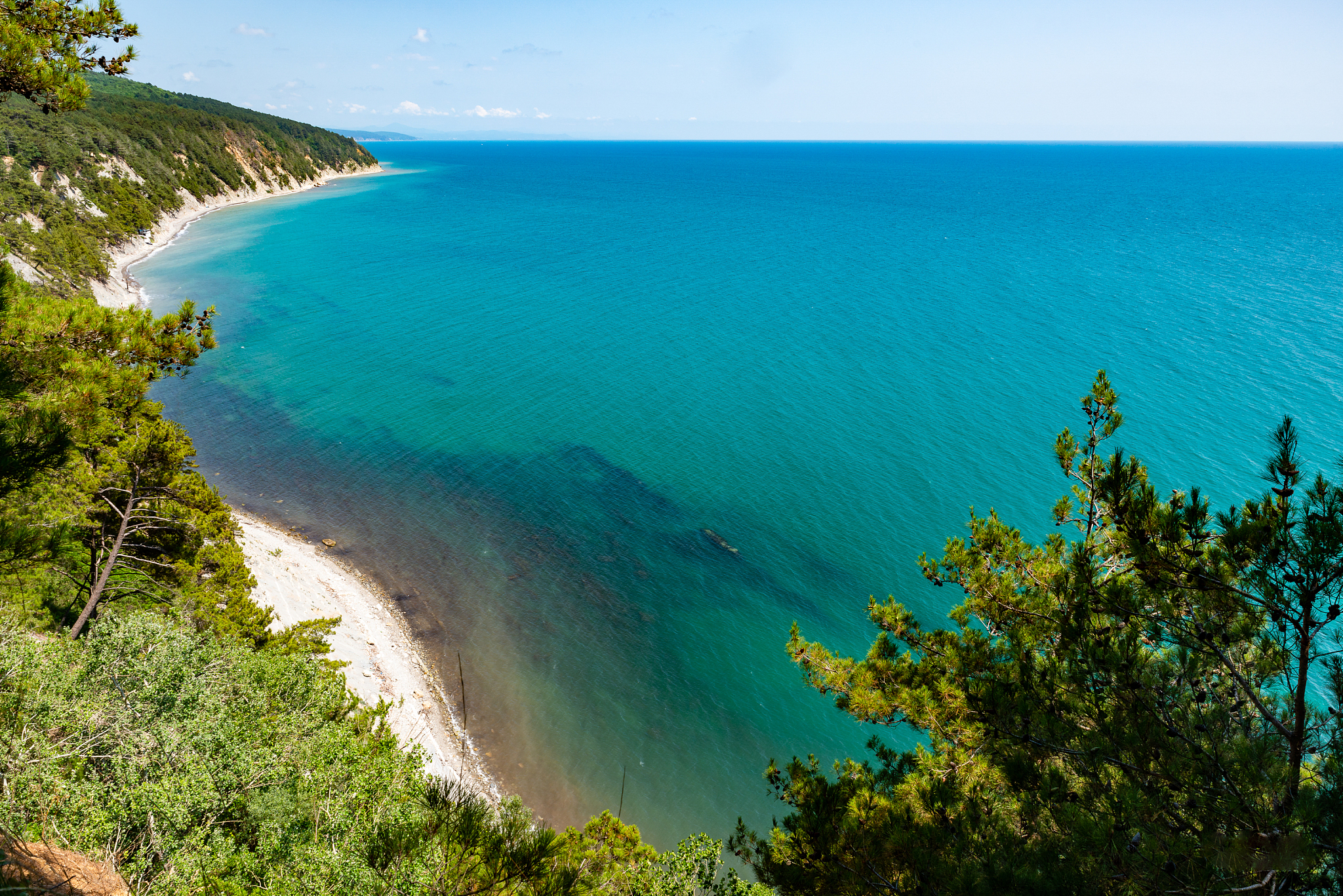 black sea. the sea and the sun. rocky beach and waves.
