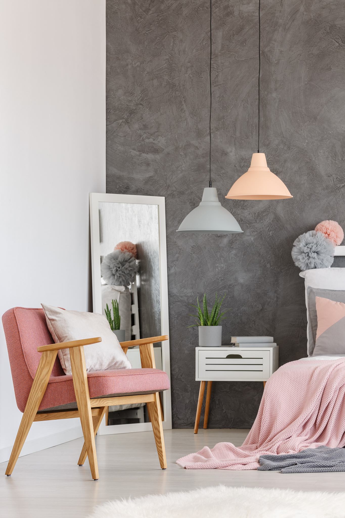 vintage pink chair in bedroom