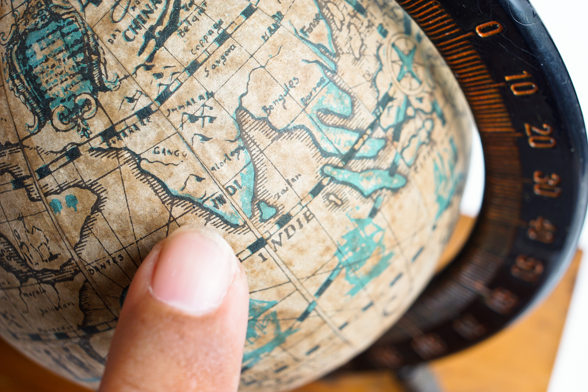 vintage global map with hand point out
