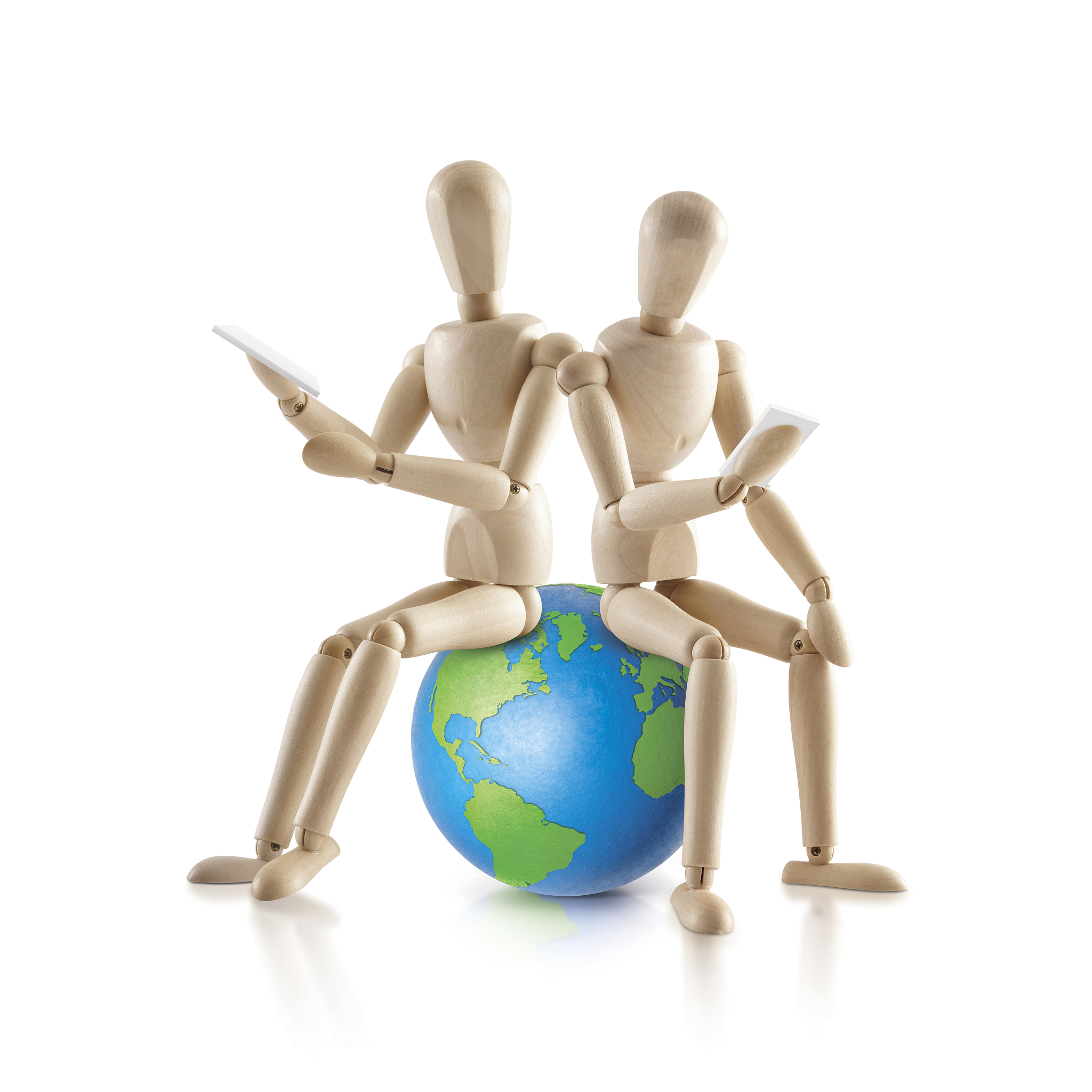 two wood model sit on the world