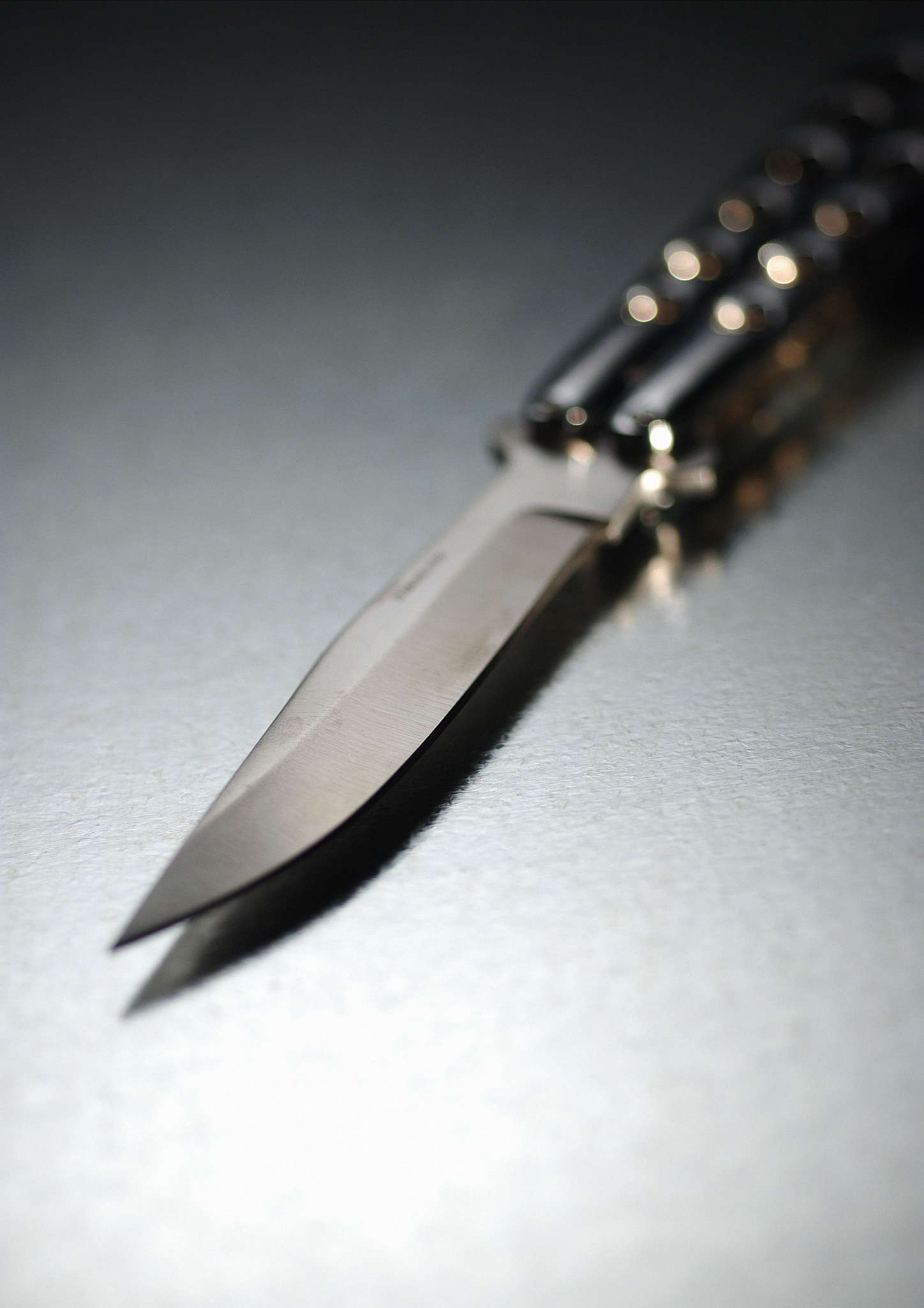 pocket knife, blurred.
