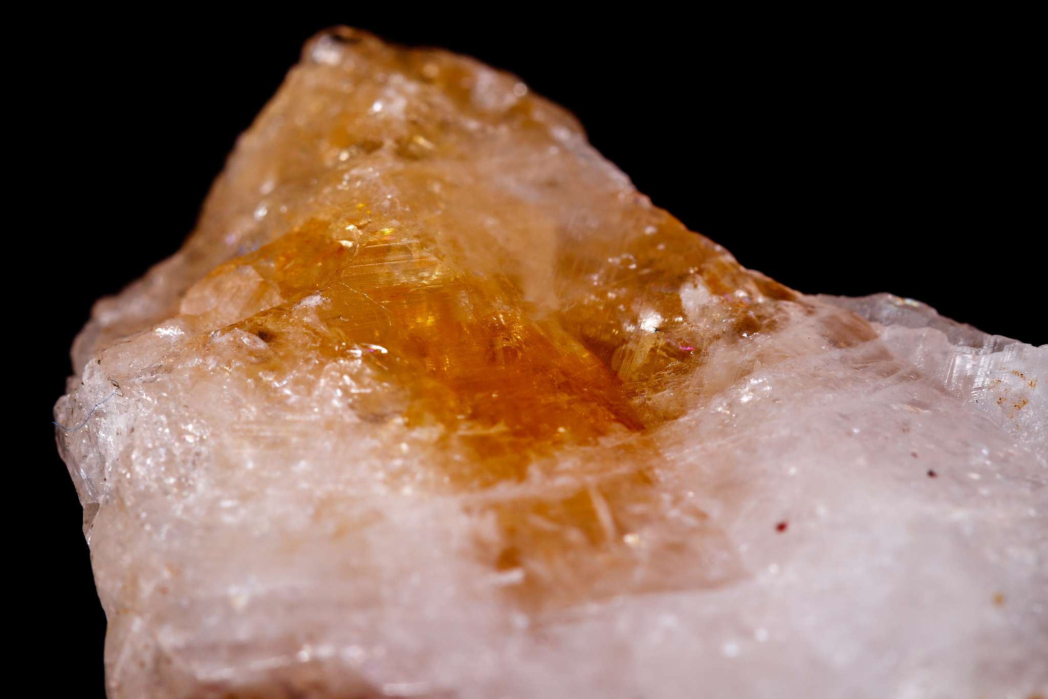 macro mineral stone citrine on black background