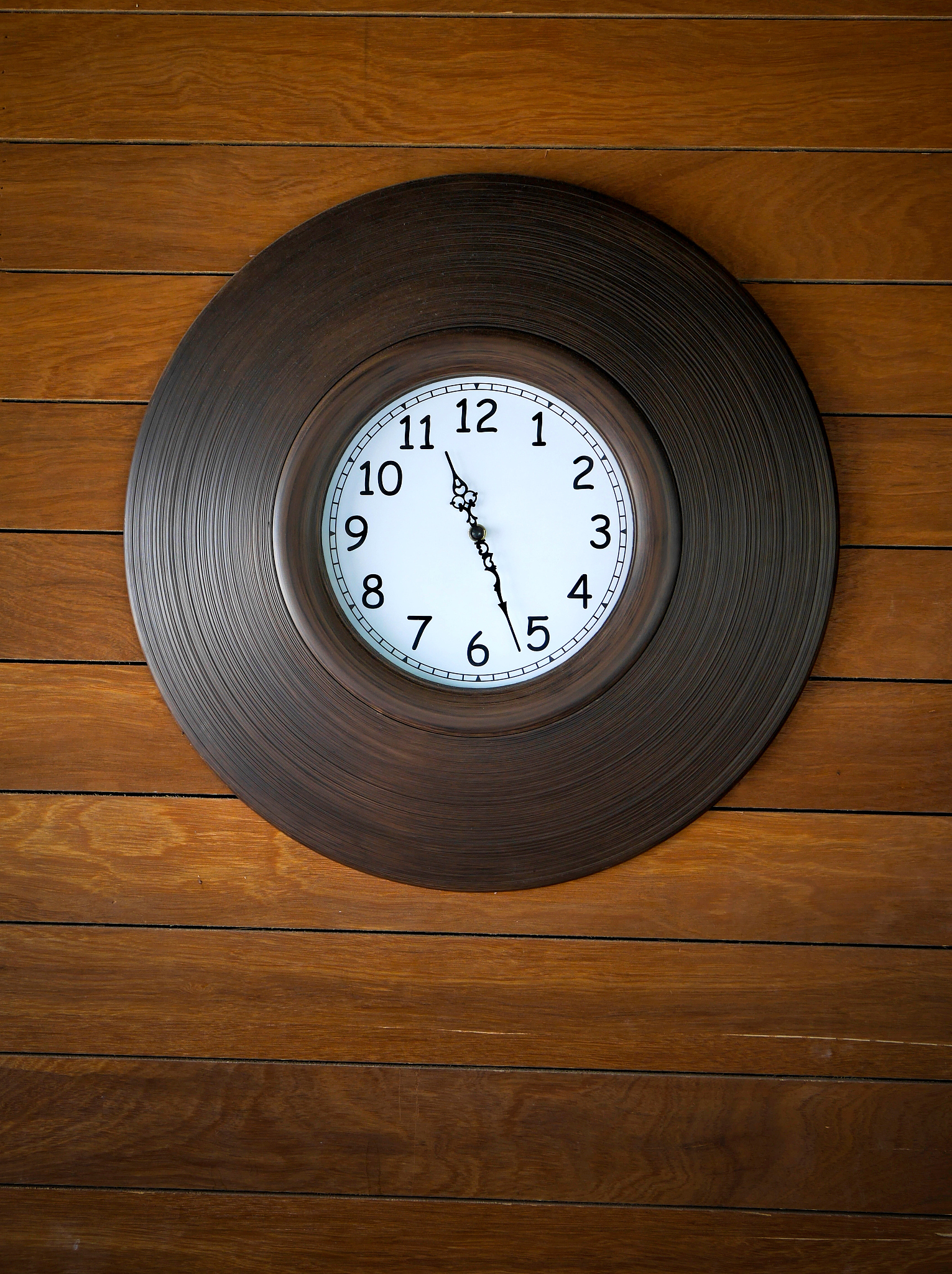 wall clock on wooden background