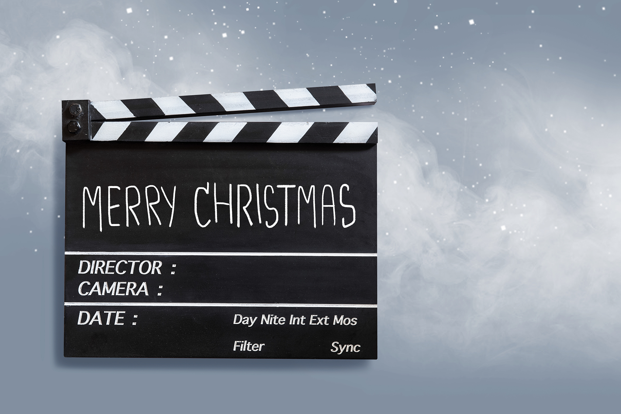 christmas text title on movie clapper board