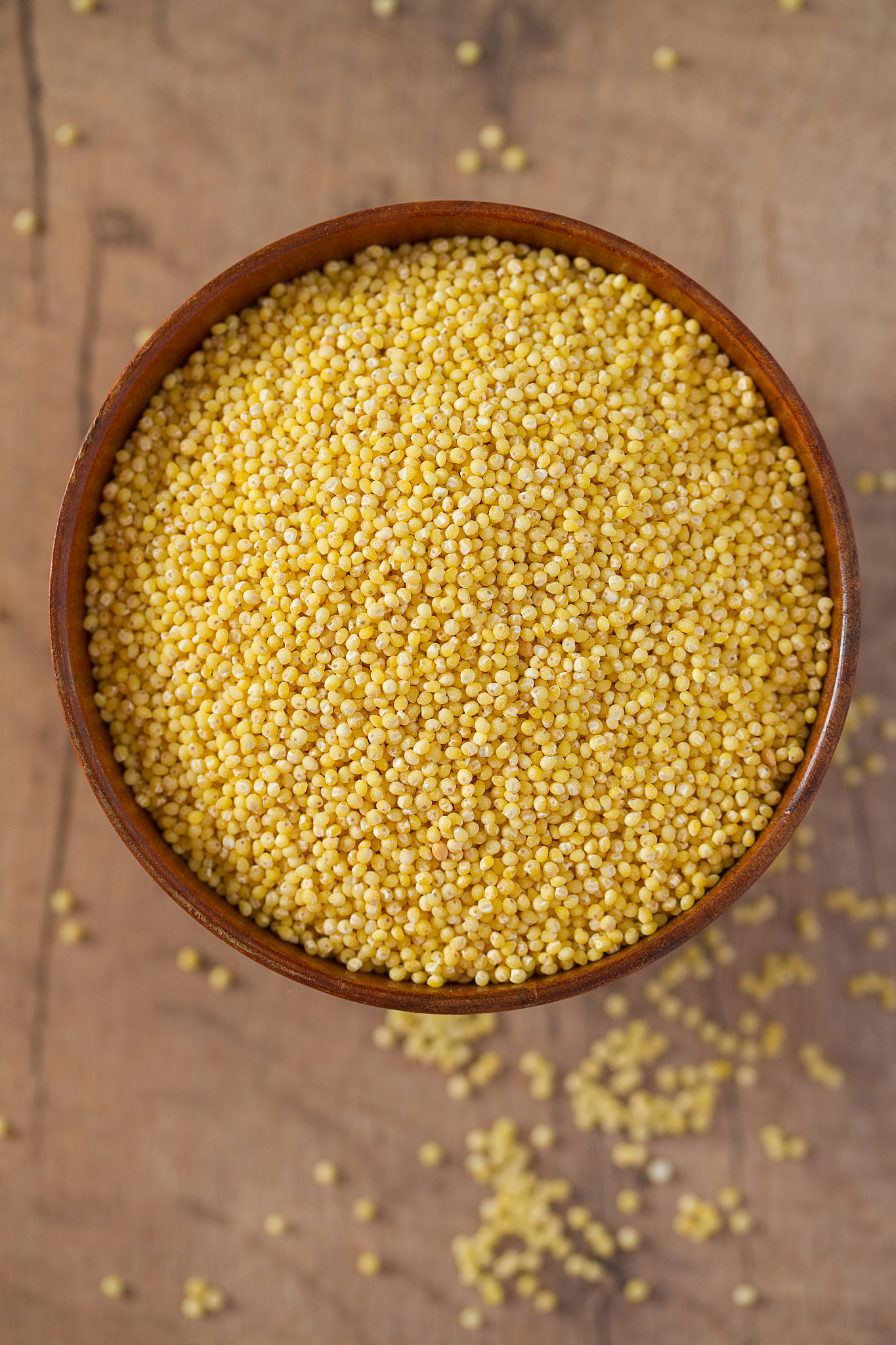 millet on wooden surface