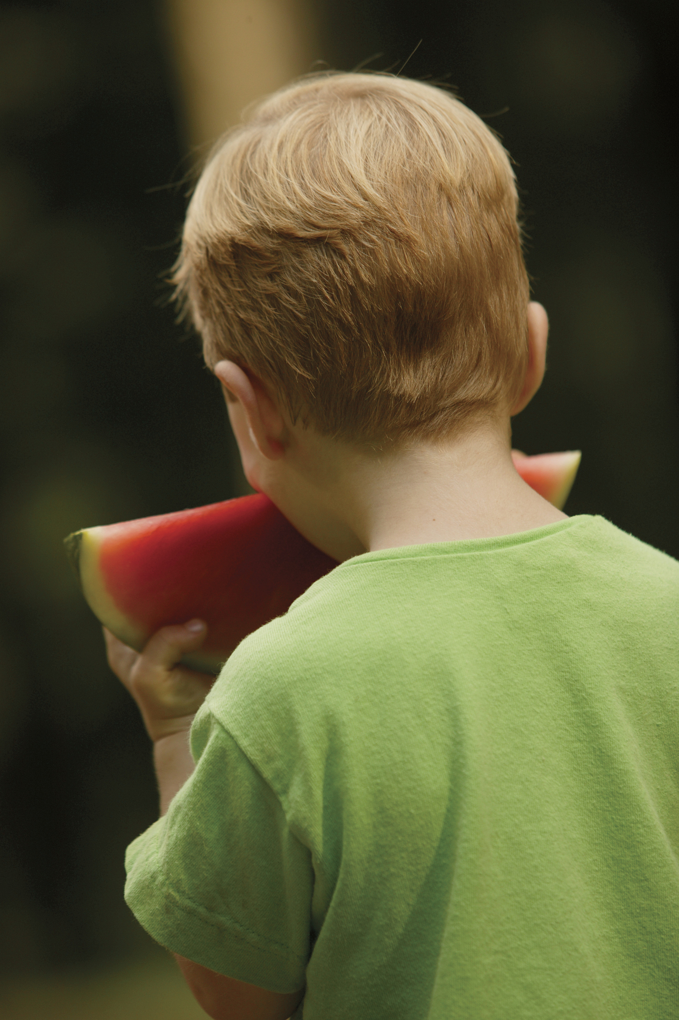 boy eating watermelon