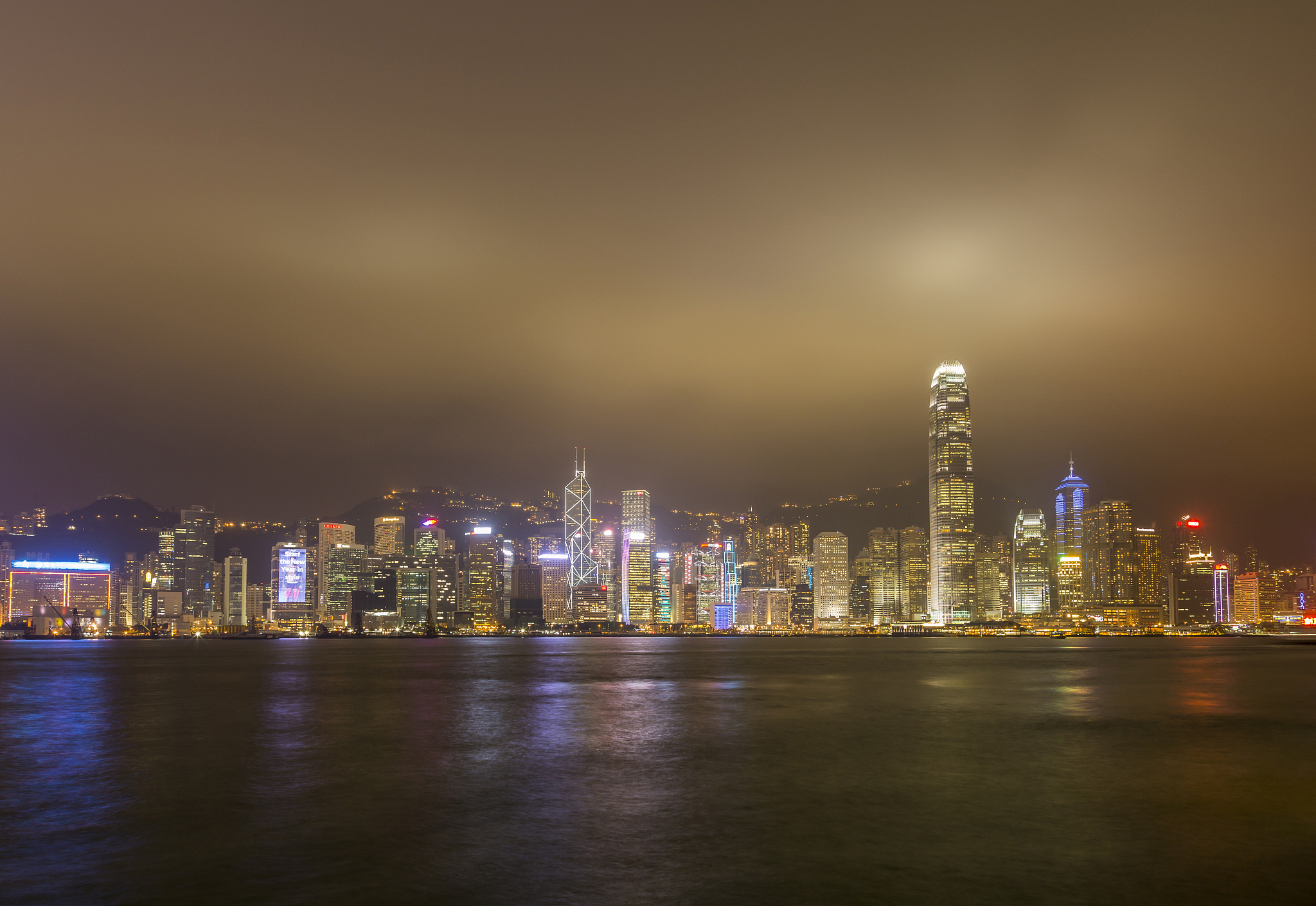 illuminated high-rise buildings in hong kong at night