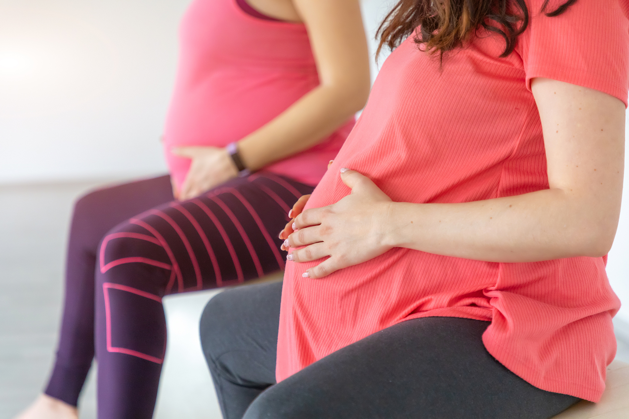 pregnant women are doing yoga and maditition in yoga class, heal