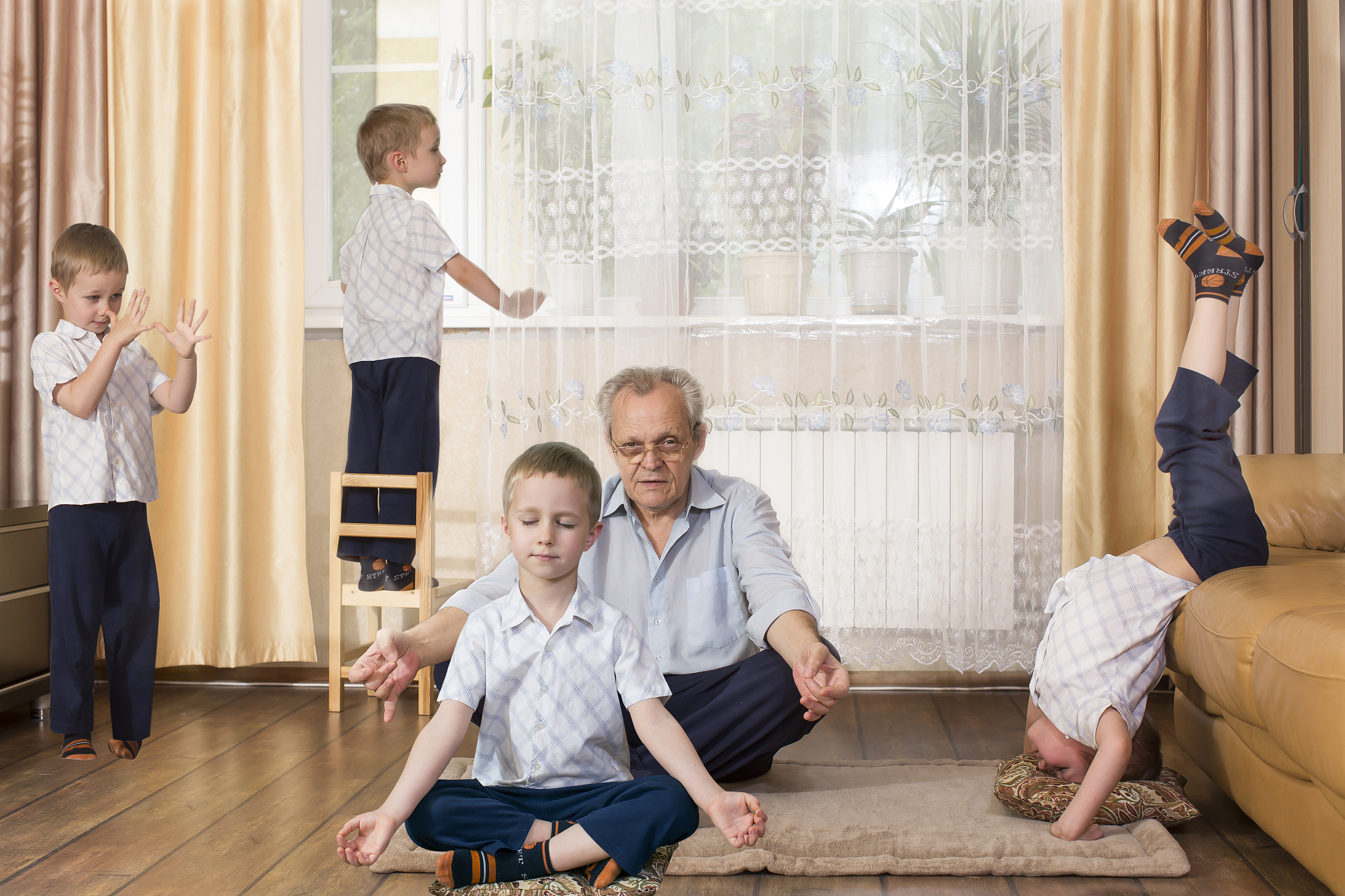 grandfather and grandson at home during a pandemic