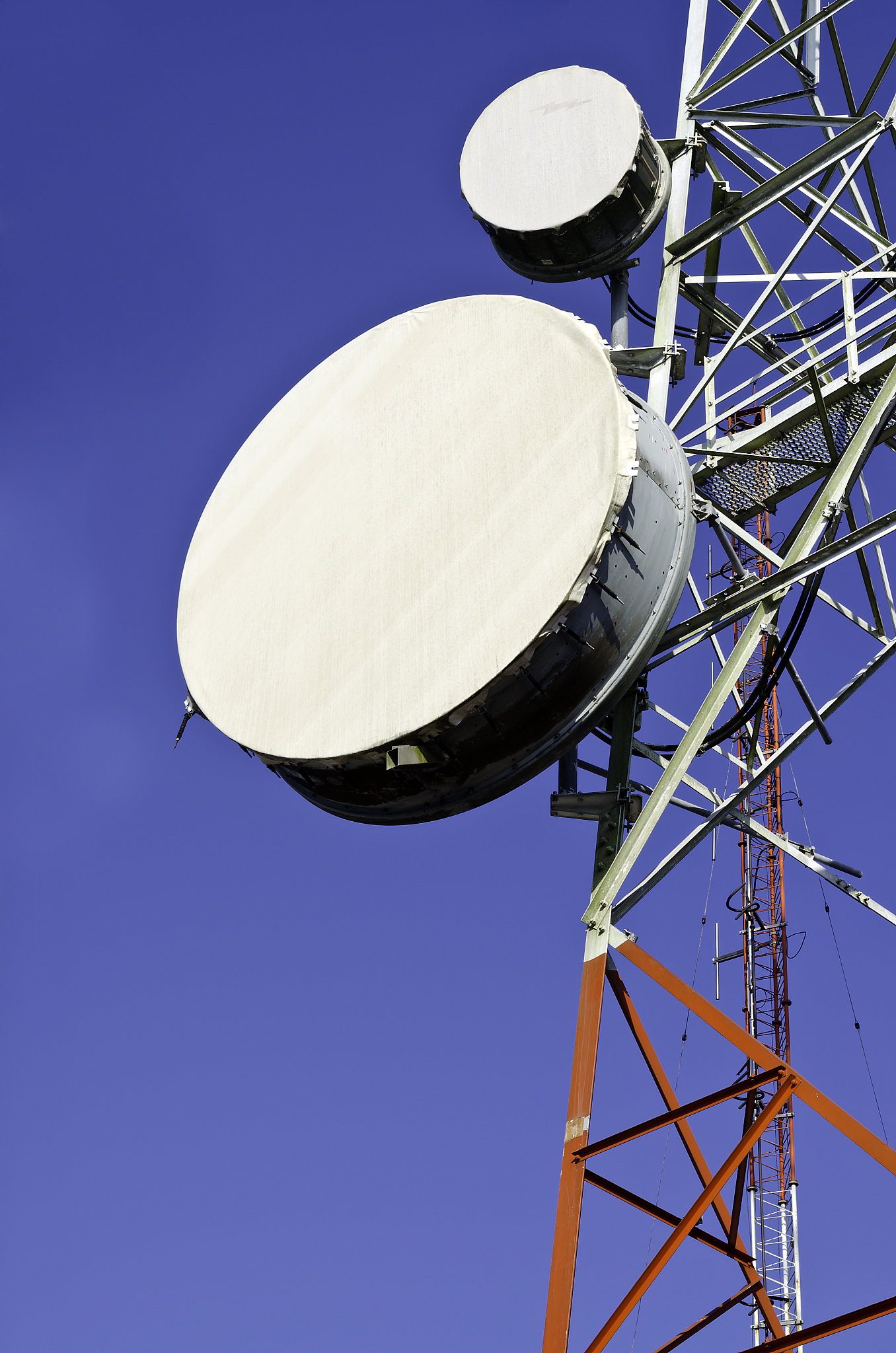 telecommunication towers with blue sky