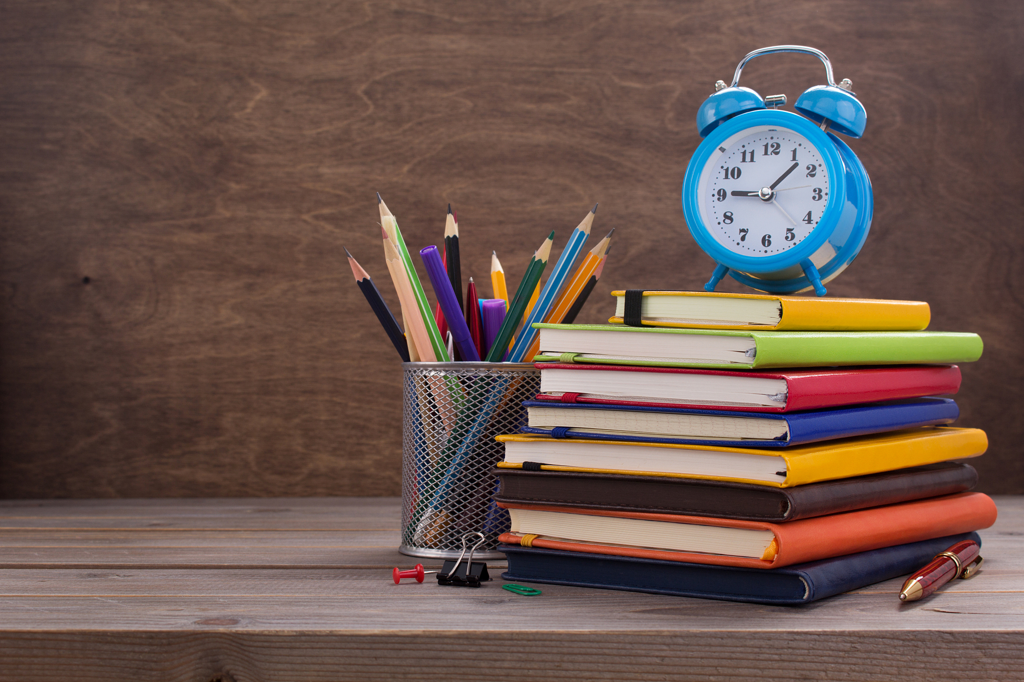 school accessories and supplies with paper notebook at table bac