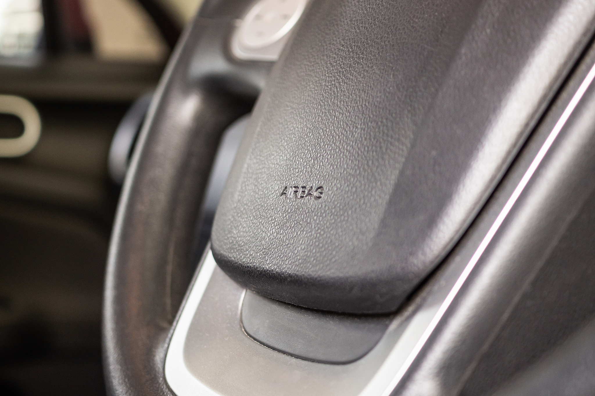 safety airbag sign on car steering wheel