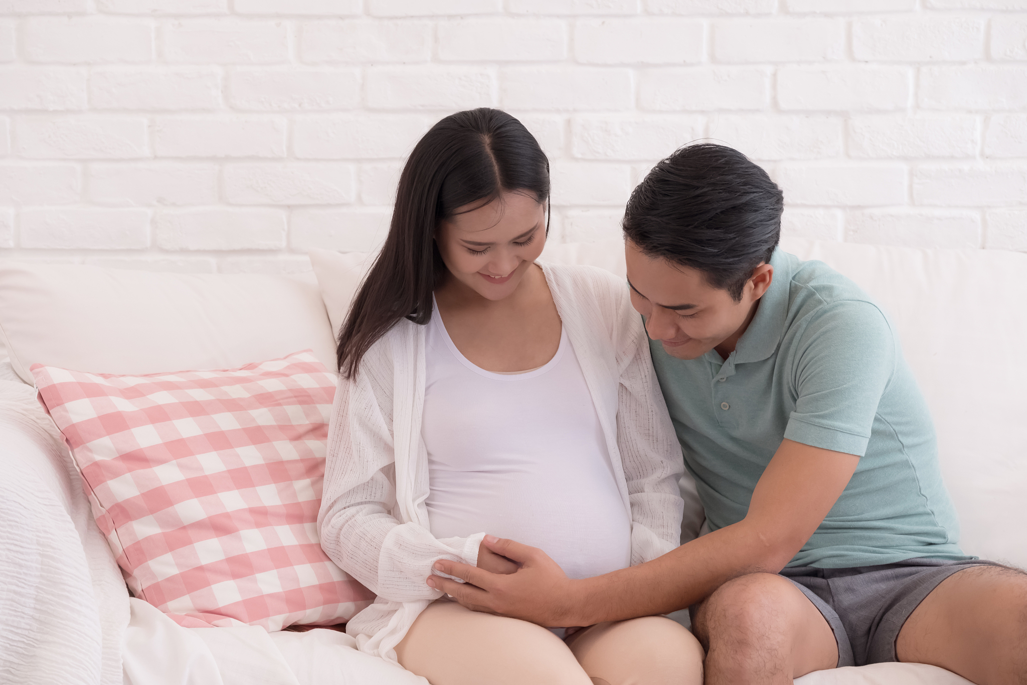 pregnant woman and her husband